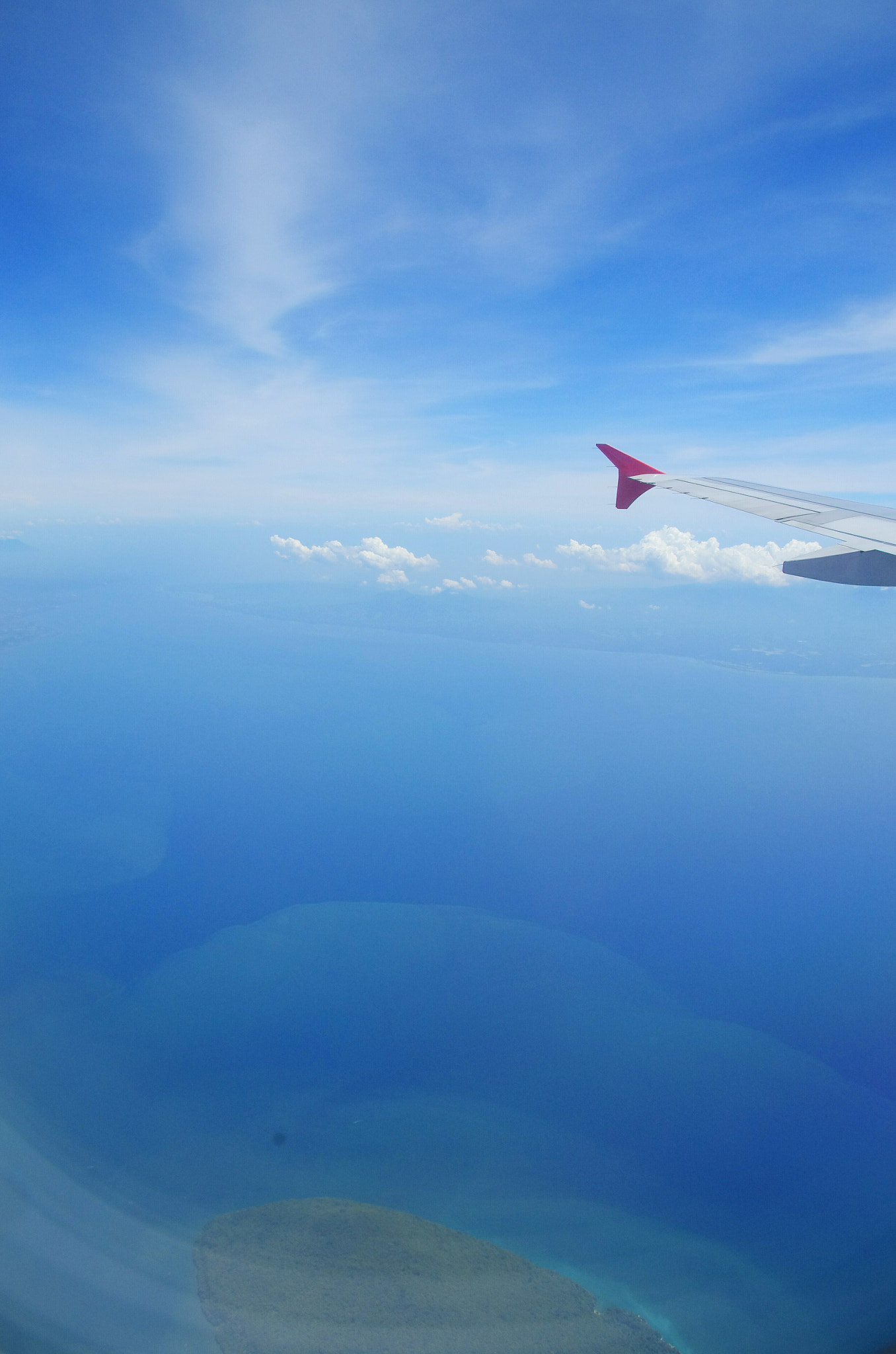 Pentax K-5 IIs sample photo. Bluesky from airplane window photography