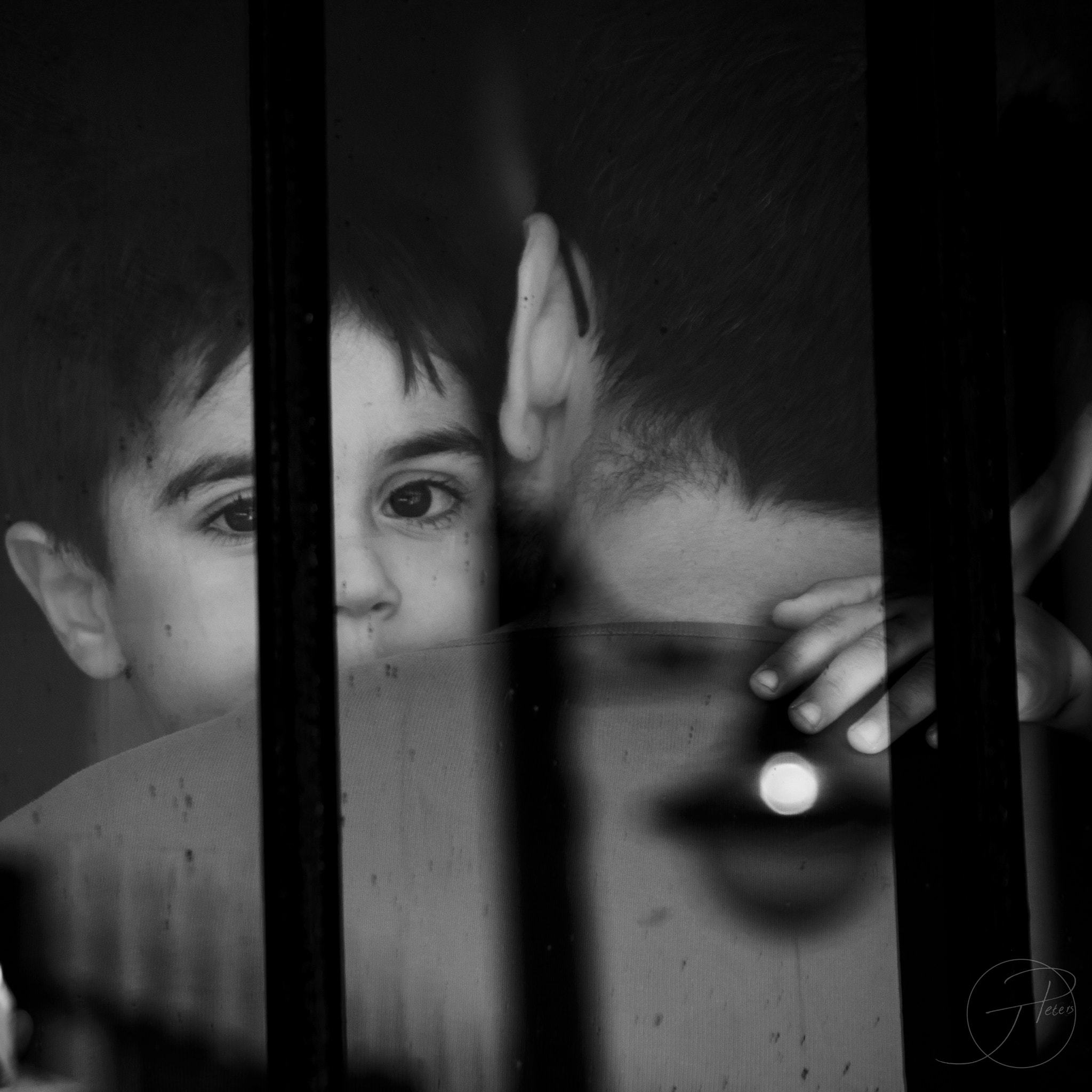 Pentax K-5 II sample photo. Boy behind the glass photography