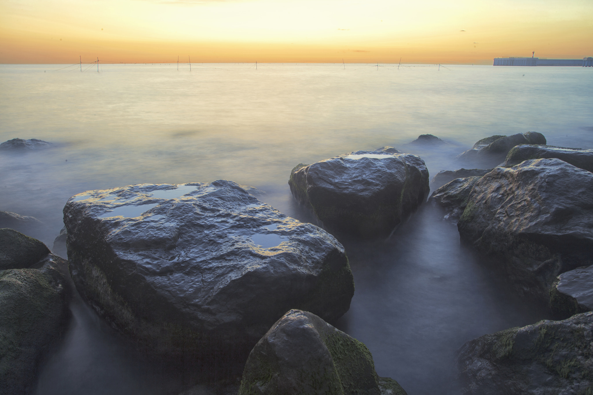 Canon EF 20-35mm f/2.8L sample photo. Sunset & rocks photography