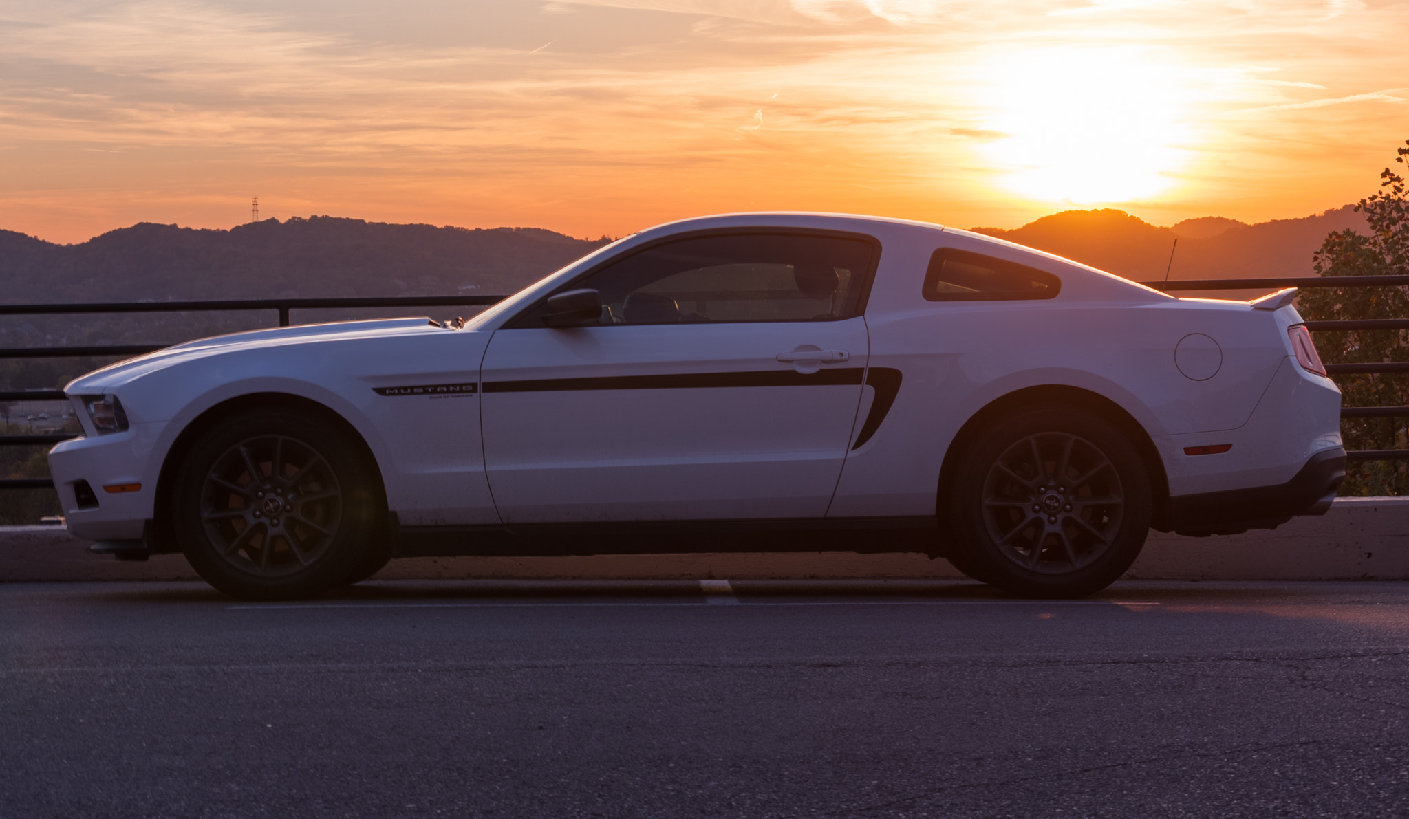 Canon EF-S 55-250mm F4-5.6 IS STM sample photo. Sleek car sunset photography