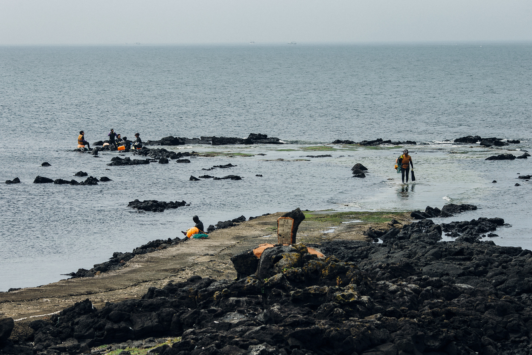 Canon EOS-1D X + Canon EF 135mm F2L USM sample photo. Jeju island women divers photography