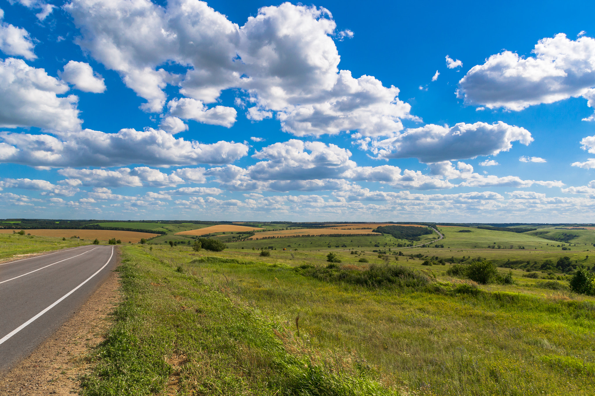 Nikon D3100 + Sigma 18-200mm F3.5-6.3 II DC OS HSM sample photo. Road in the hills photography