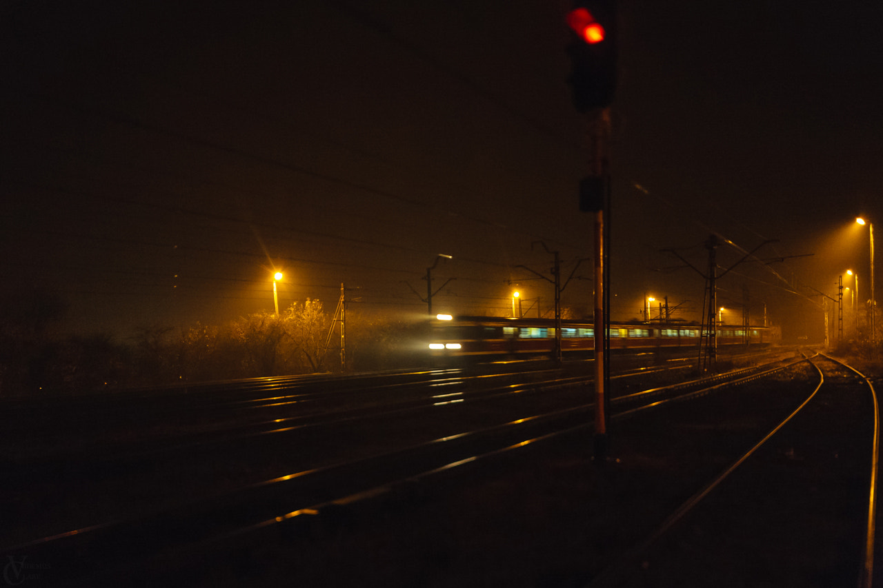Canon EOS 5D + Canon TS-E 24mm f/3.5L sample photo. Suburban night train photography