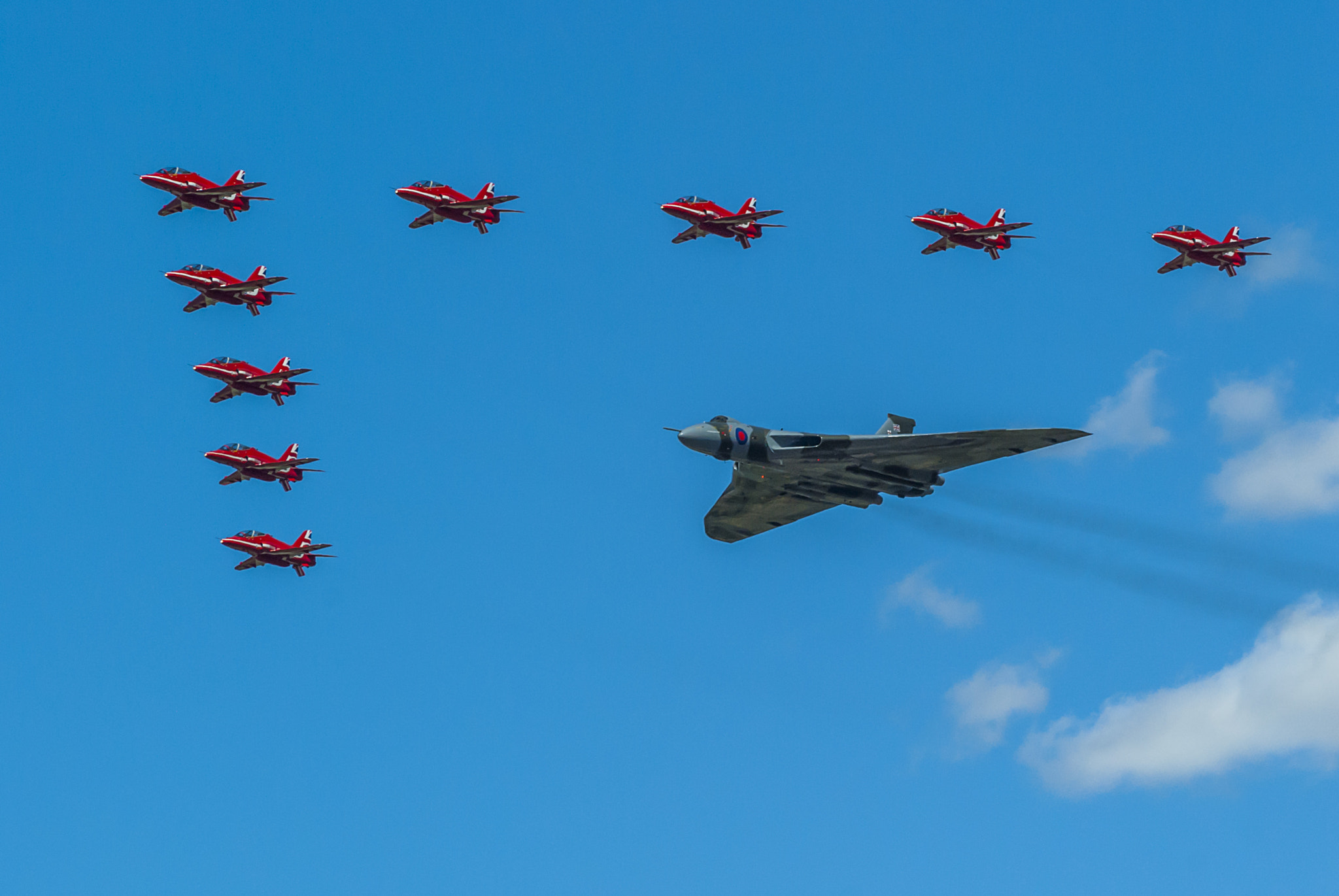 Sony Alpha DSLR-A200 + Tamron AF 70-300mm F4-5.6 Di LD Macro sample photo. Vulcan bomber with red arrows escort photography