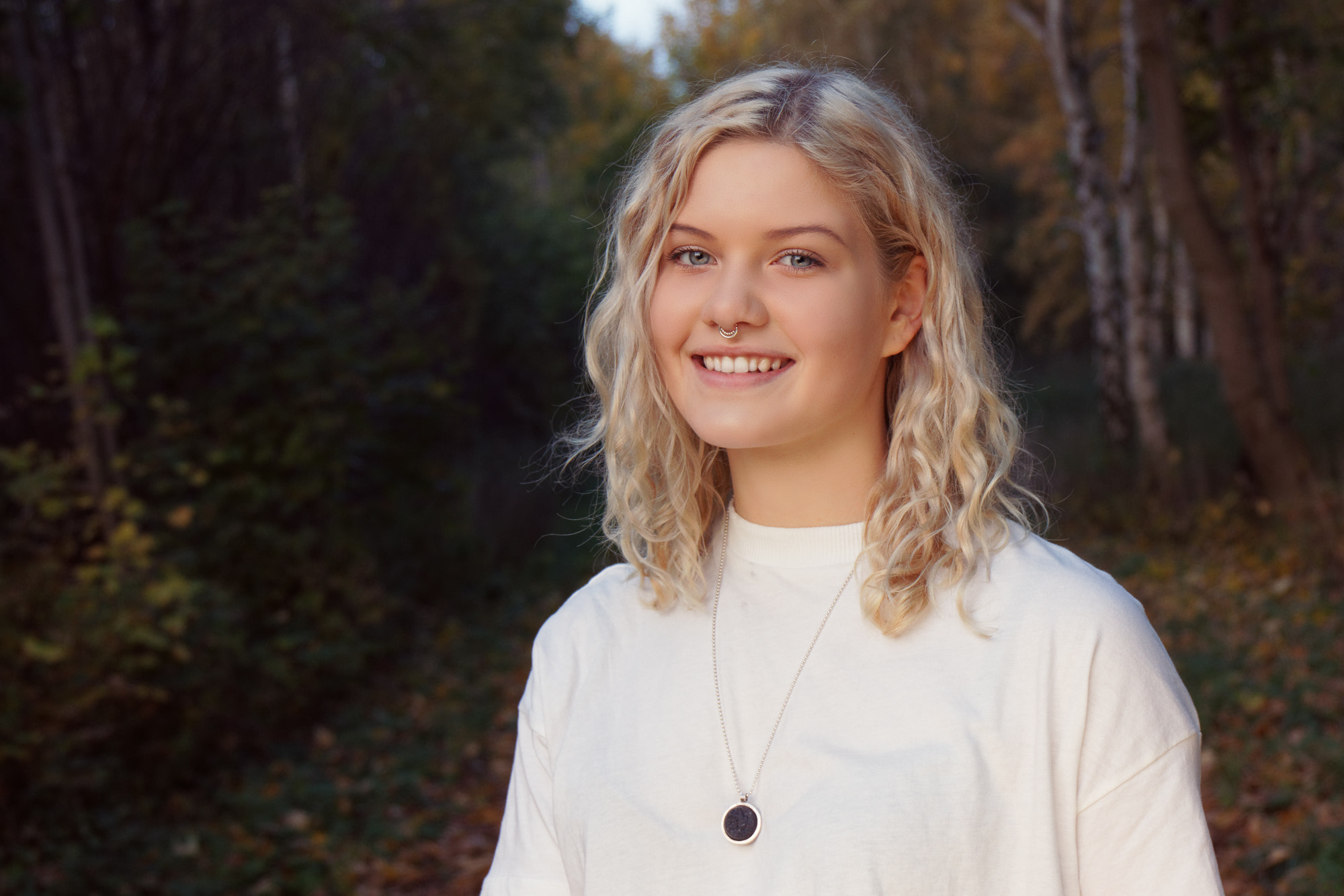 Canon EF 24-70mm F4L IS USM sample photo. Sigrid smiles in the wood photography