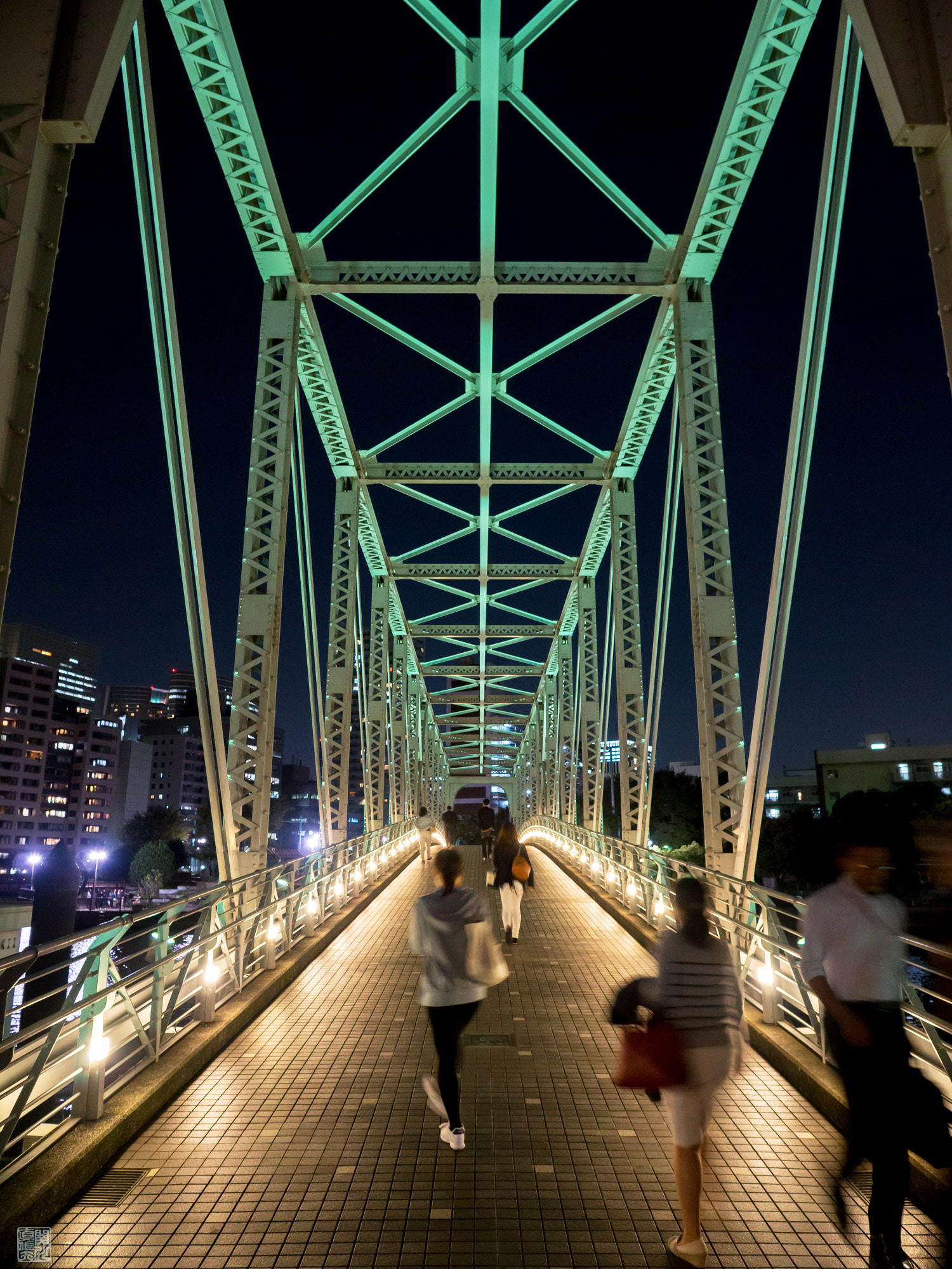 Olympus OM-D E-M10 II + OLYMPUS M.12mm F2.0 sample photo. Crossing over the bridge to the station photography