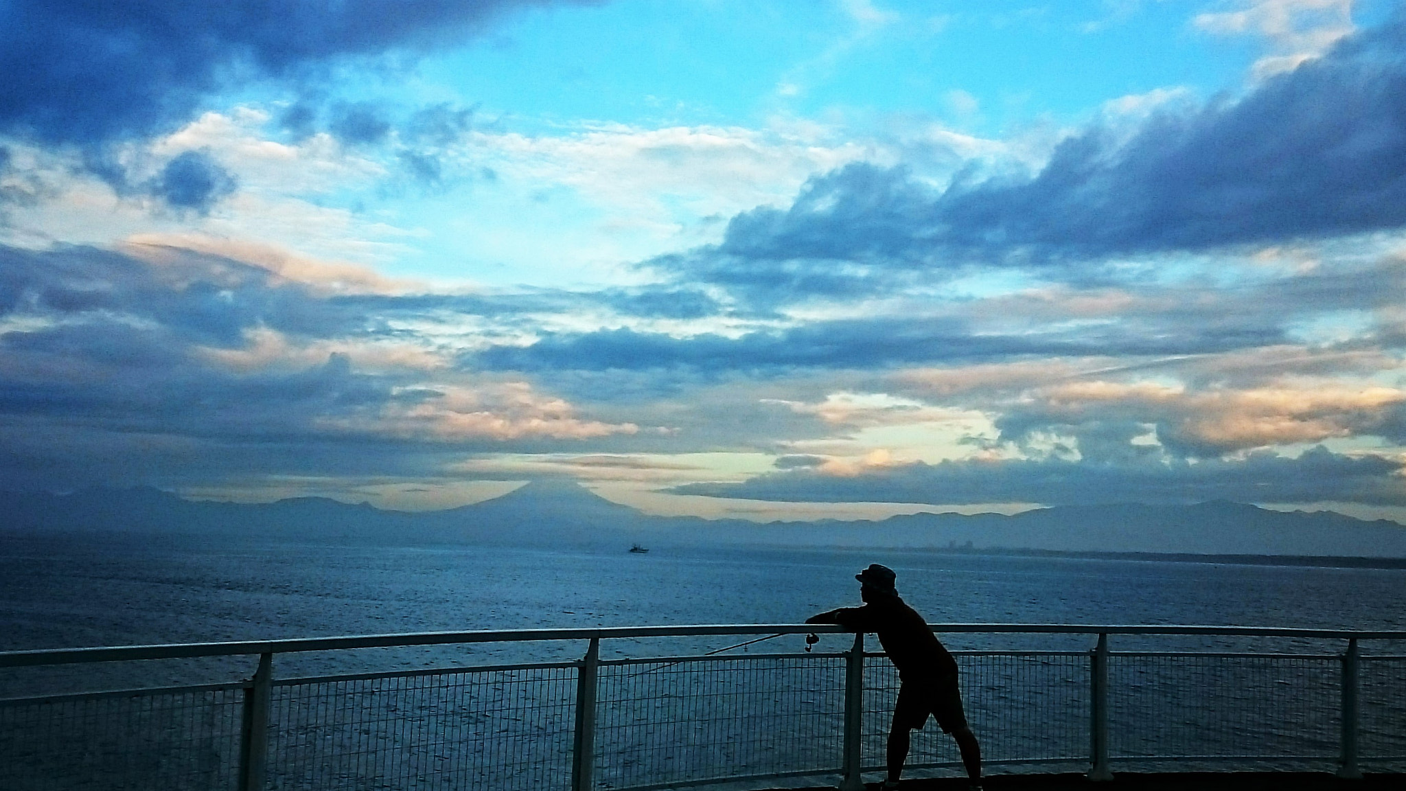 Sony Xperia Z Ultra sample photo. Sunrise clouds with fishing person. photography