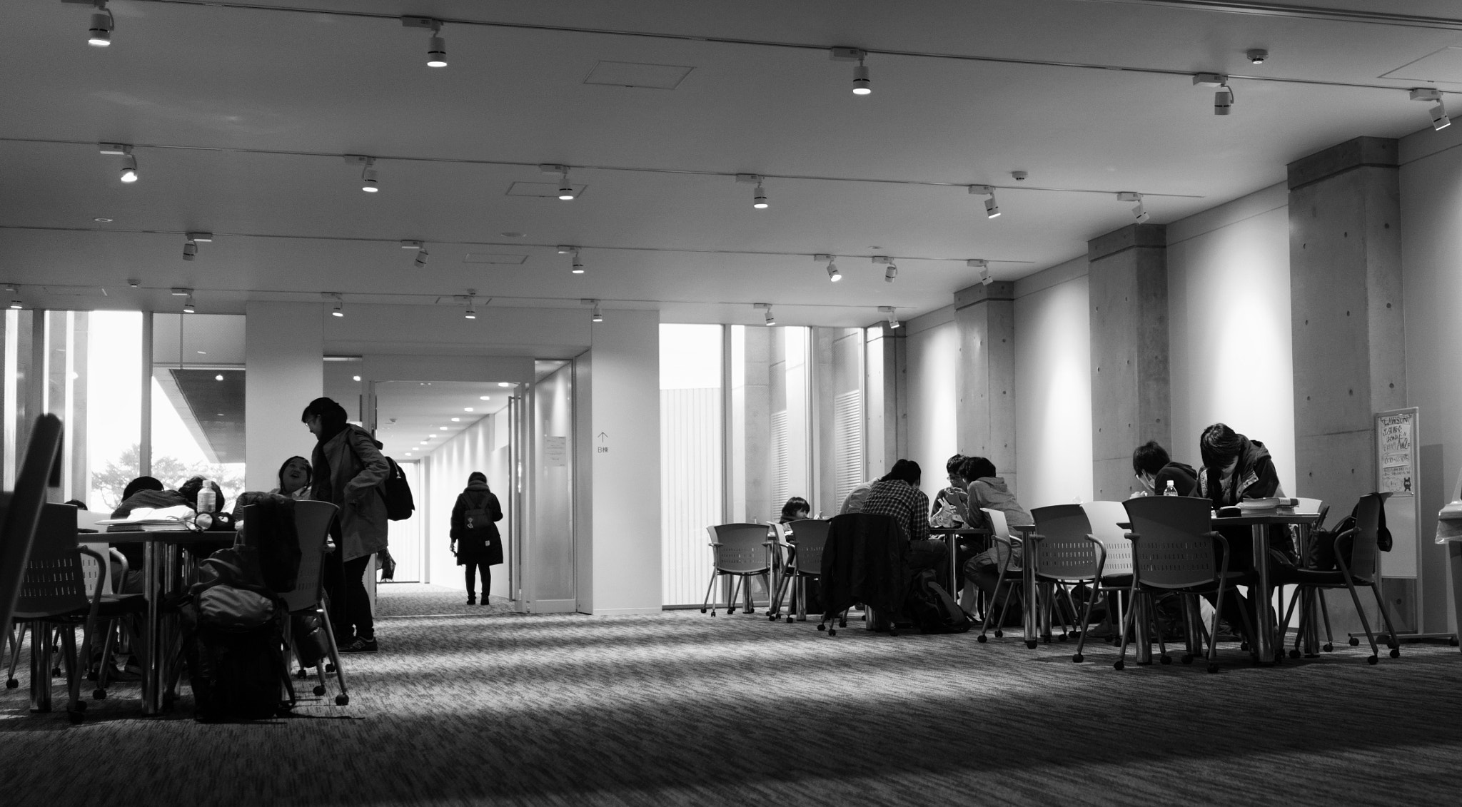 Sony Sonnar T* E 24mm F1.8 ZA sample photo. Pharmacy student self-study in floor space photography