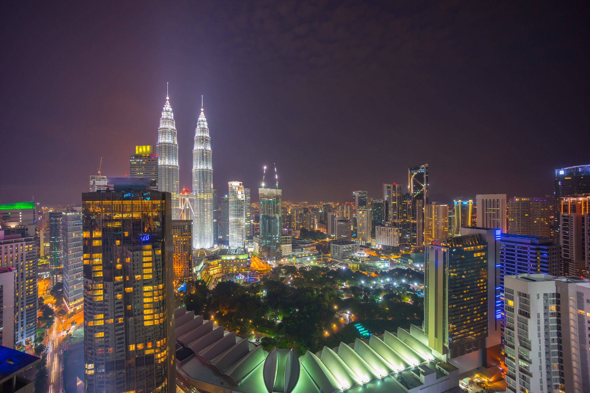 Sony a7R + Sony E 10-18mm F4 OSS sample photo. Kuala lumpur city skyline at night. aerial view. photography