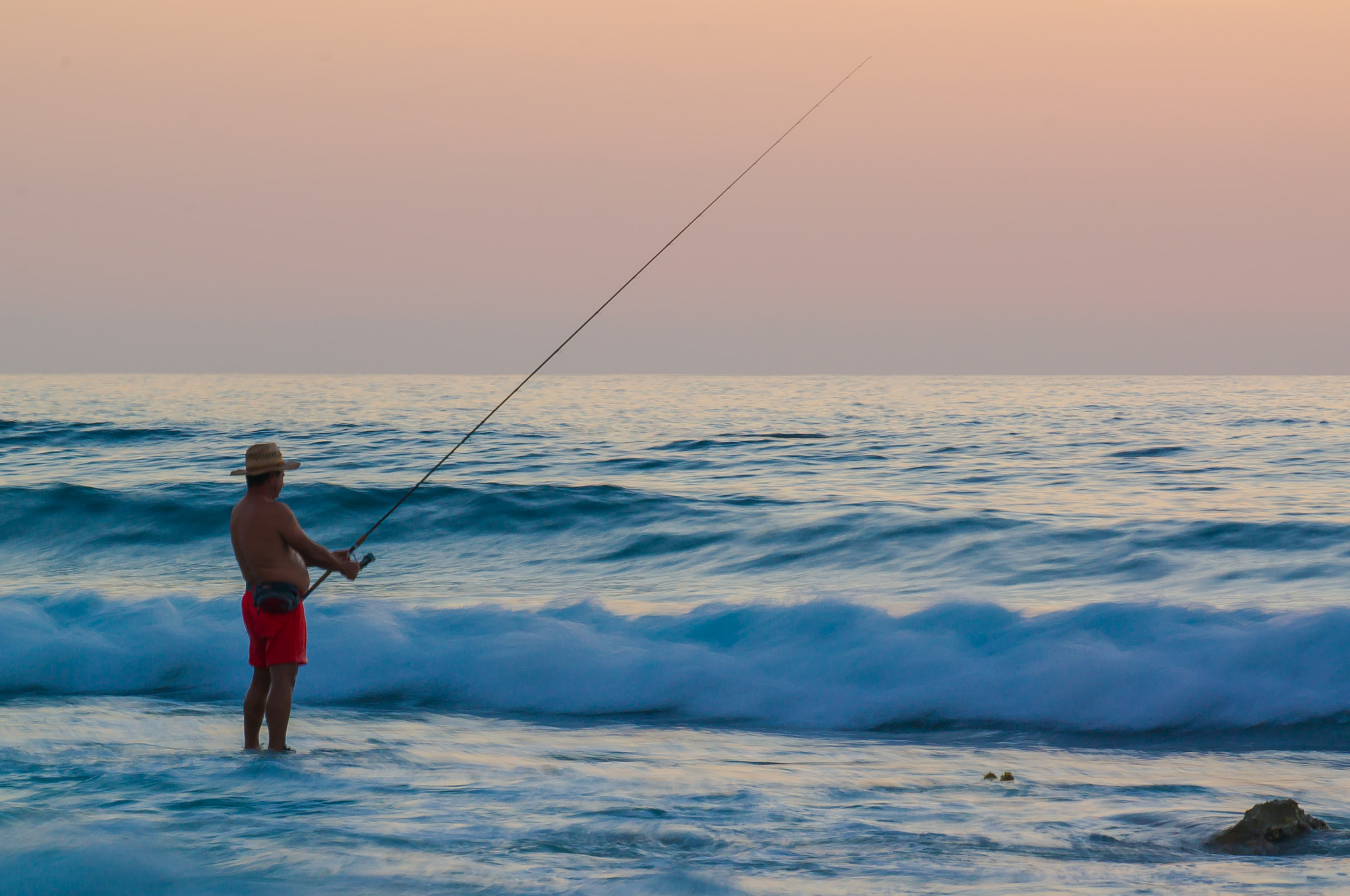 Sony Alpha NEX-5R sample photo. Fisherman and the sea photography