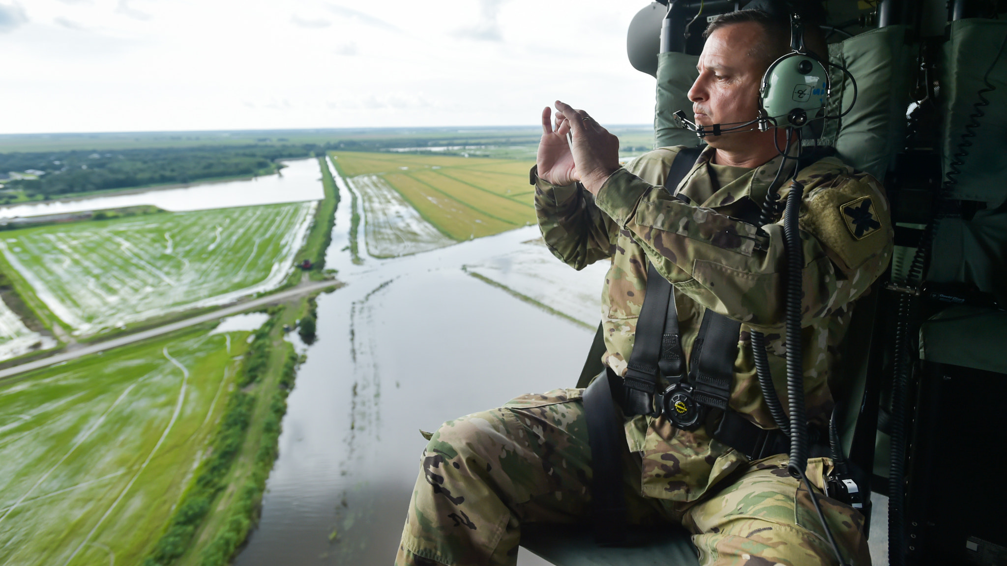 Nikon AF-S Nikkor 17-35mm F2.8D ED-IF sample photo. Ltc william haygood evaluates the work to repair the levee along hwy 713 in gueydan, la. photography