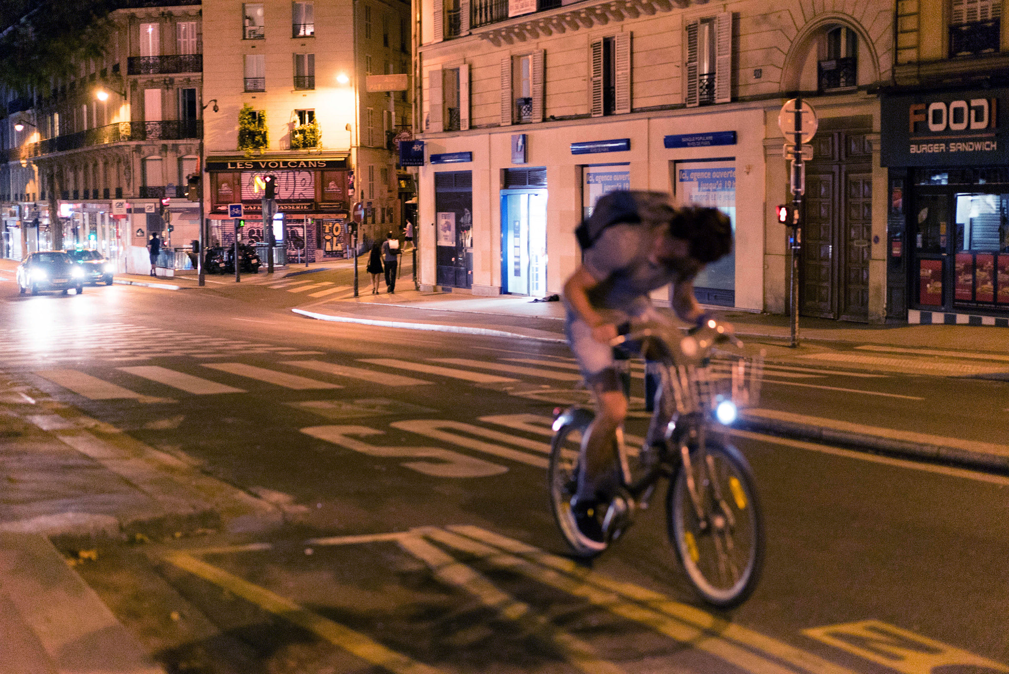 Sony a7S II + Sony Sonnar T* FE 55mm F1.8 ZA sample photo. A biker in paris photography