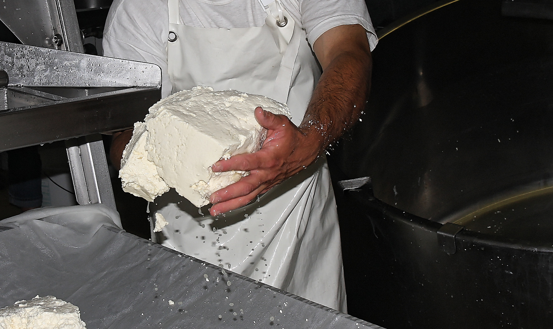 Sigma 17-70mm F2.8-4 DC Macro OS HSM sample photo. Making cheese can be art photography