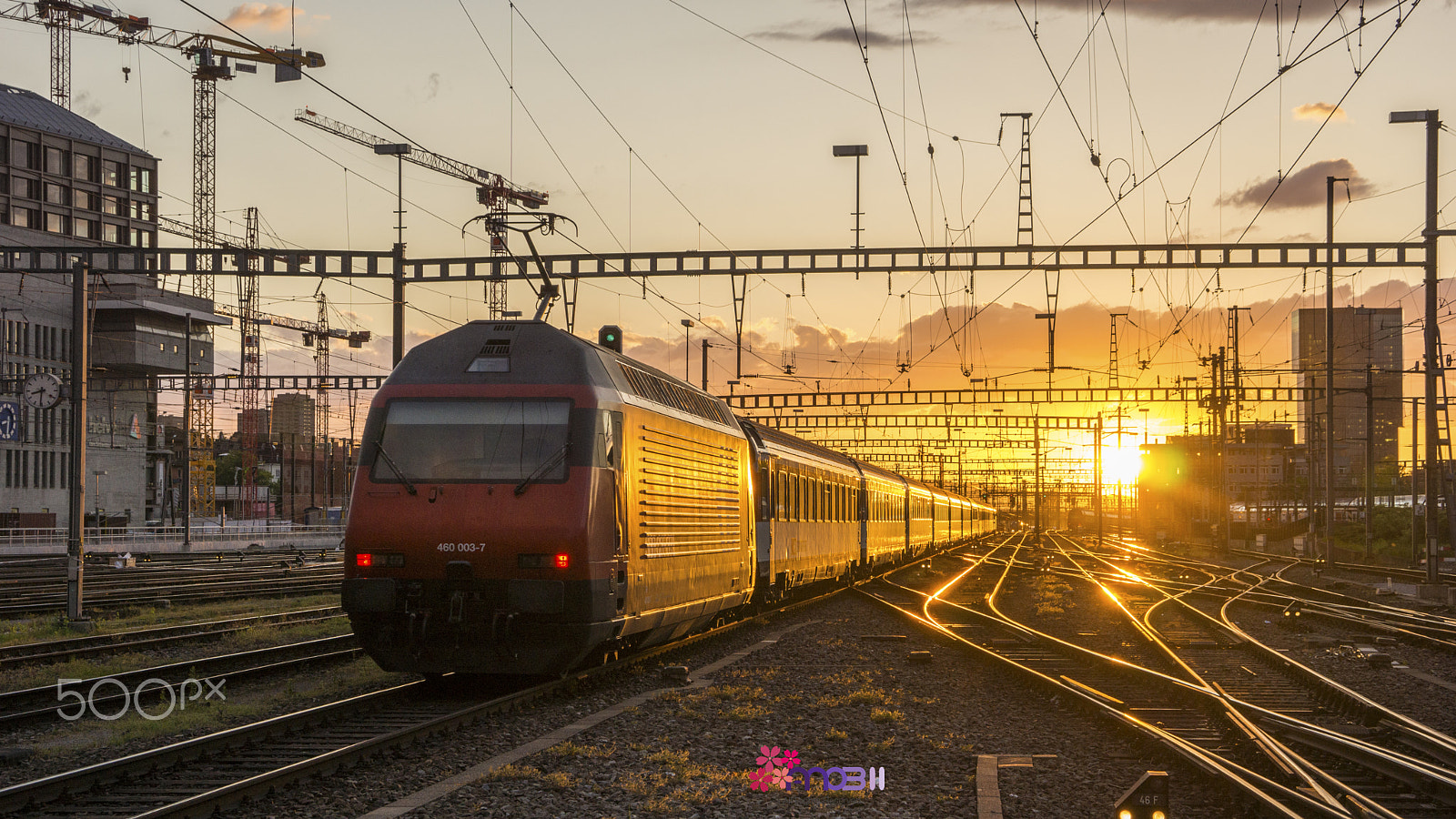 Sony E 18-200mm F3.5-6.3 OSS sample photo. Sunset in zurich station, switzerland. photography
