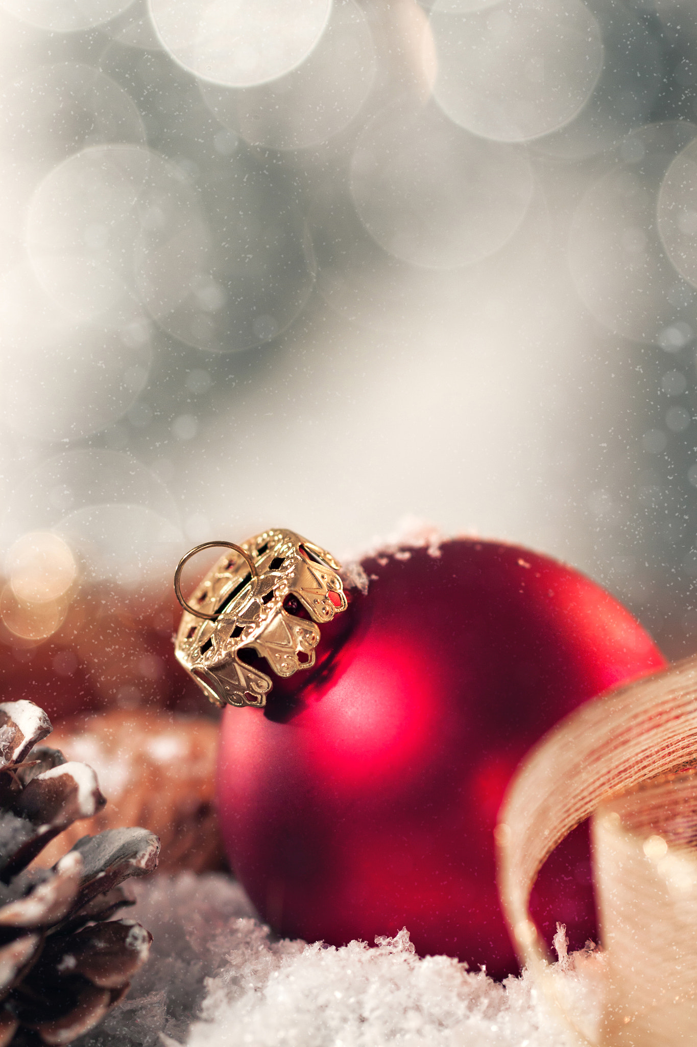 Canon EF 100mm F2.8L Macro IS USM sample photo. Christmas ball with decoration with candles, fir cones, nuts, snow and ribbon, closeup, toned photography