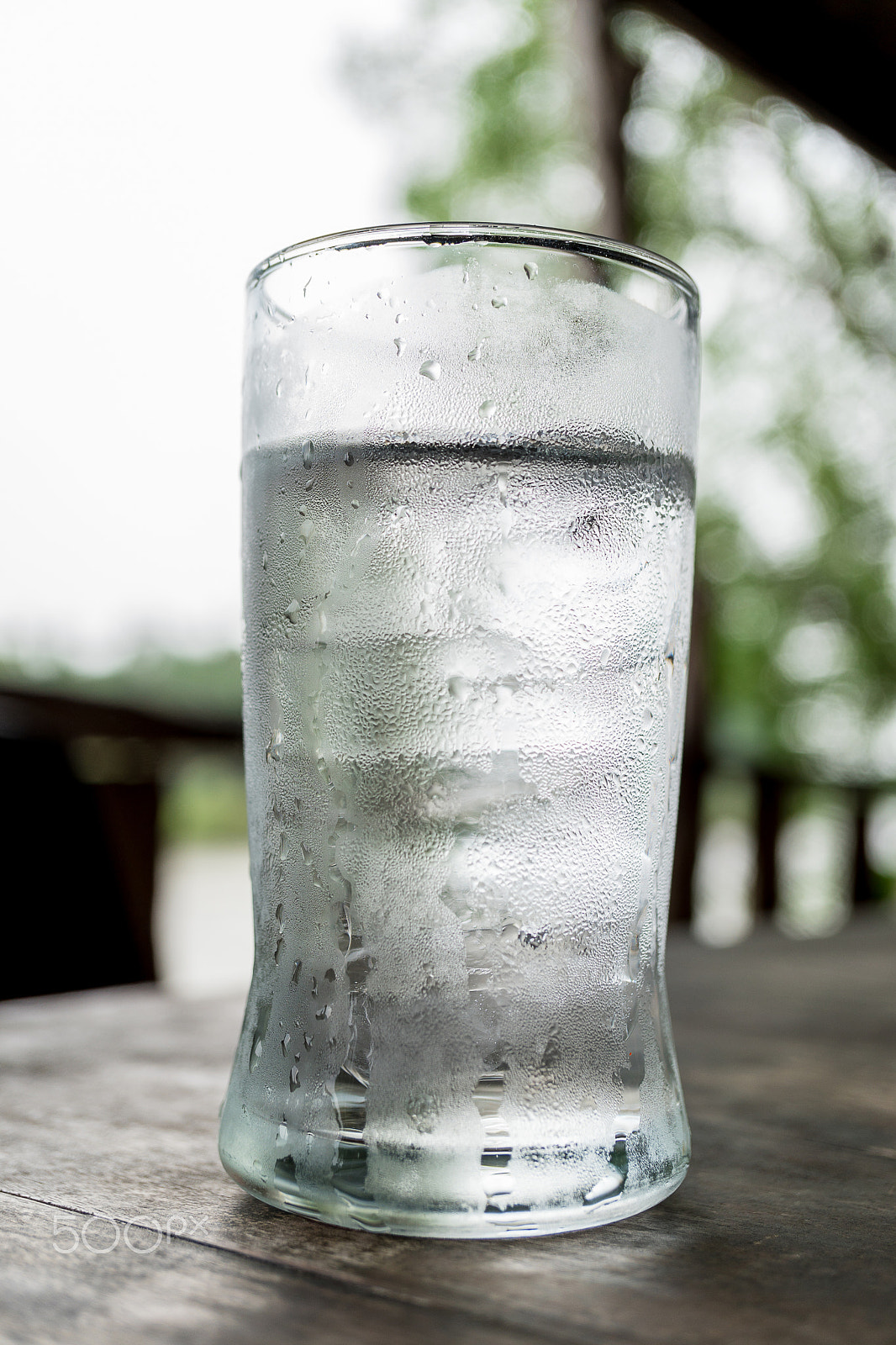 Sony a6300 + Sony E 30mm F3.5 Macro sample photo. Drinking water on the table photography