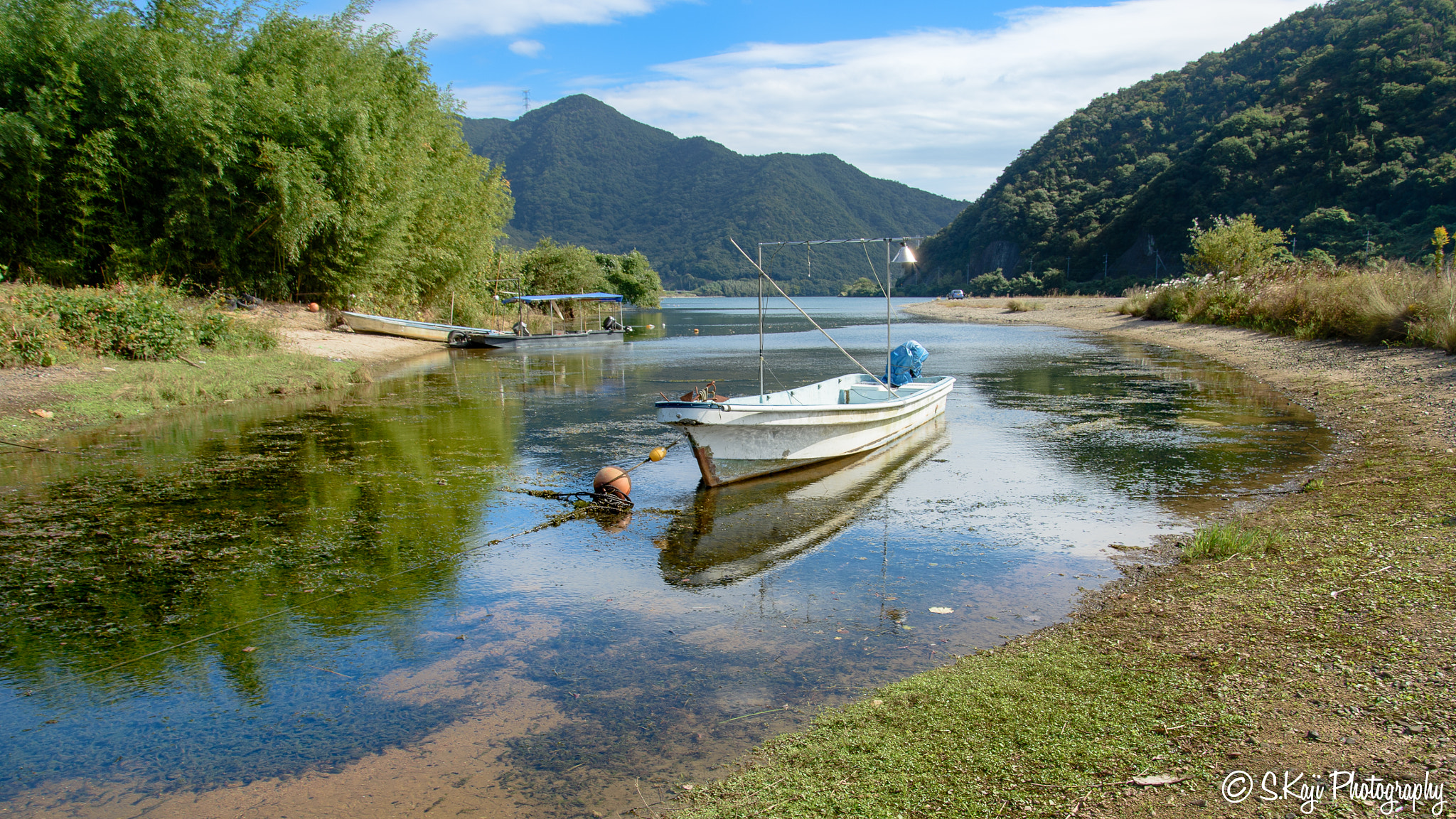 Nikon Df sample photo. A river and a boat photography