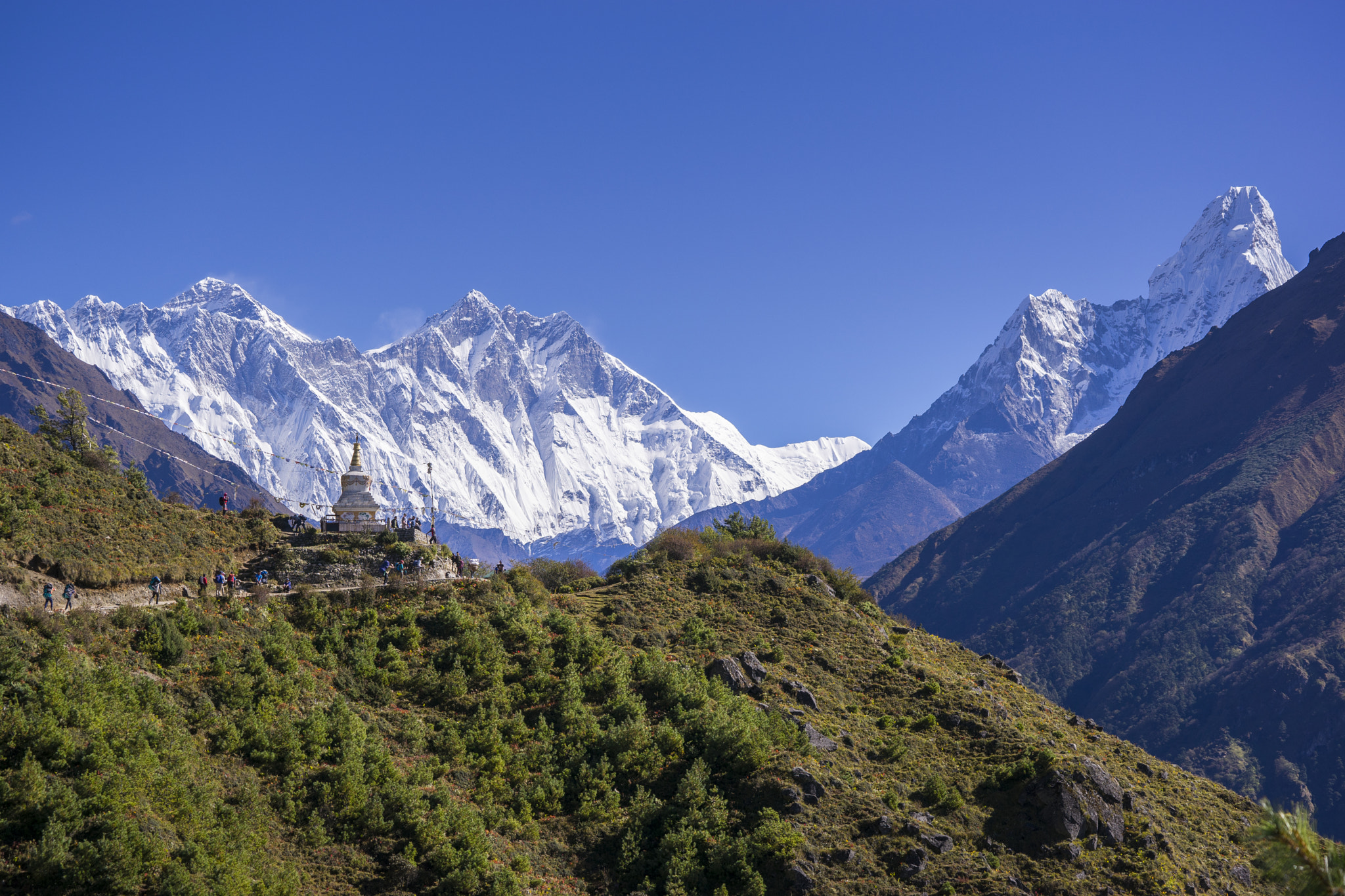 Tamron SP 70-300mm F4-5.6 Di USD sample photo. Buddhist stupa with himalaya moutain behind photography