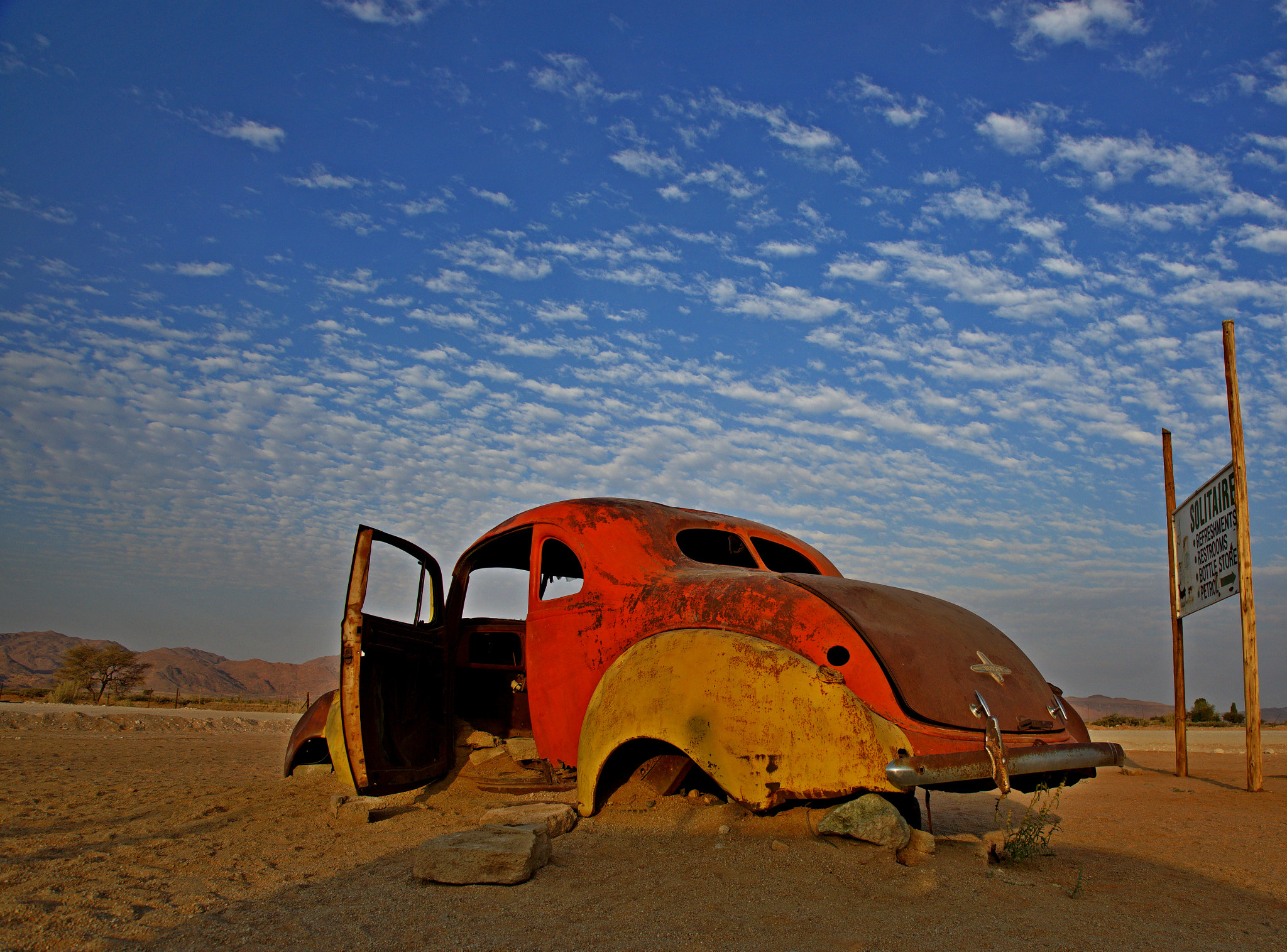 Sony a7 II + Canon EF 24-105mm F4L IS USM sample photo. Lost car in africa photography