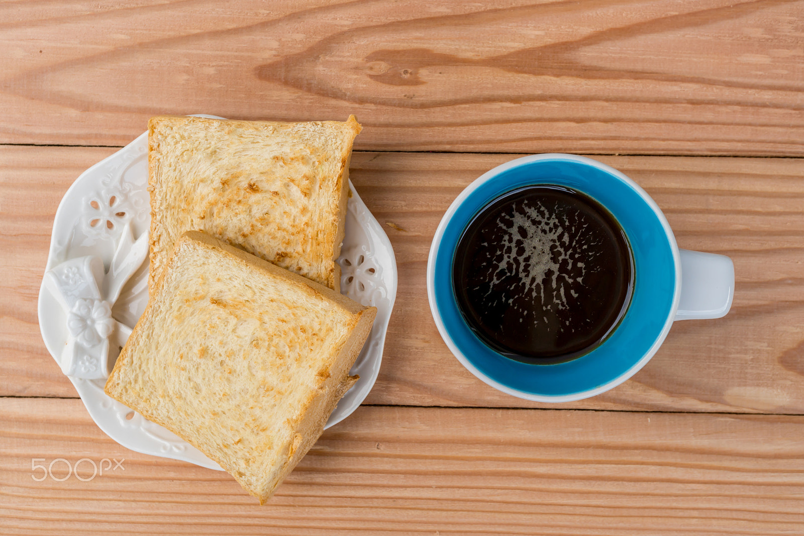 Sony a6300 + Sony E 30mm F3.5 Macro sample photo. Black coffee and toast on wood background photography