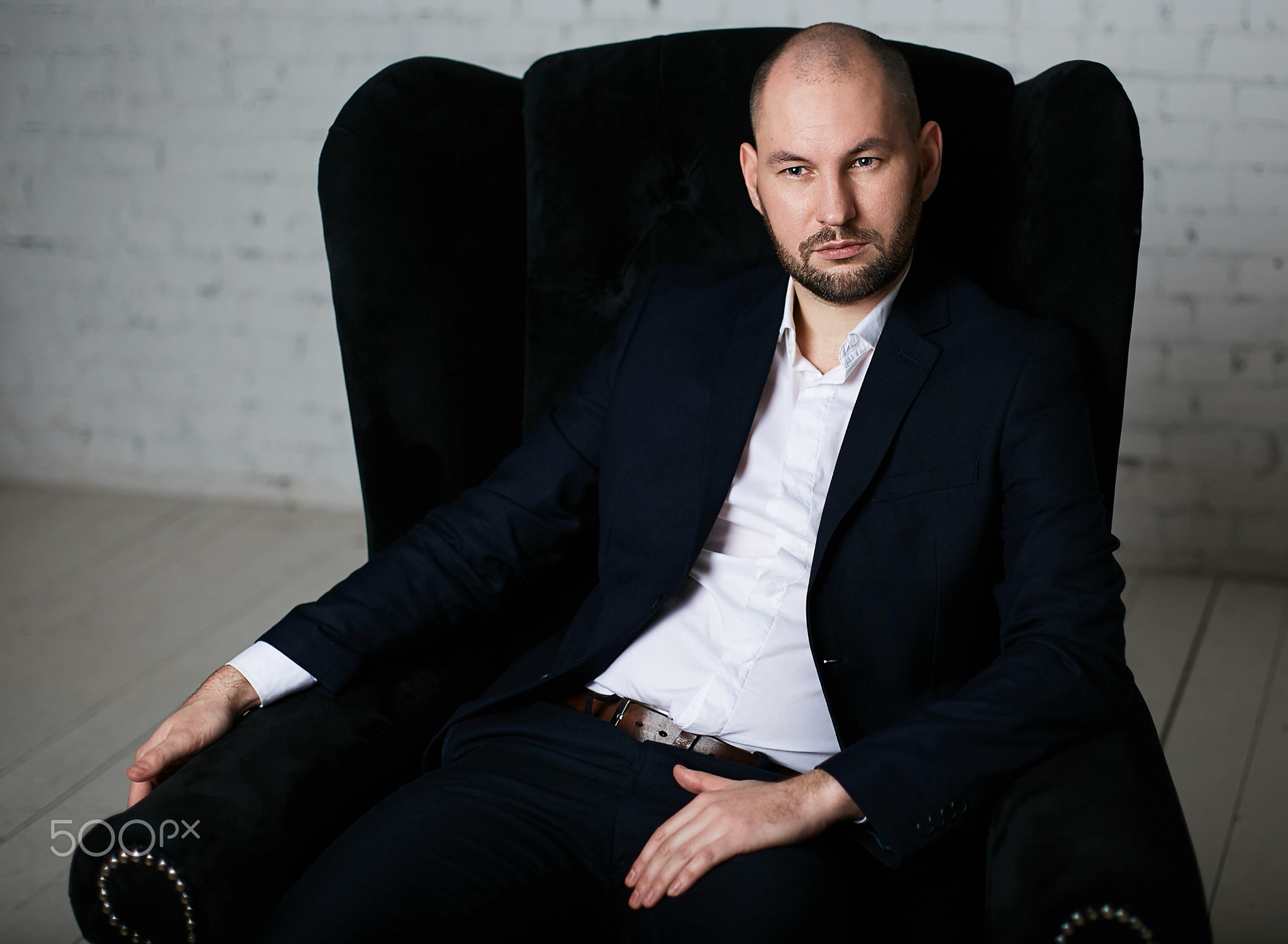 businessman sitting in chair