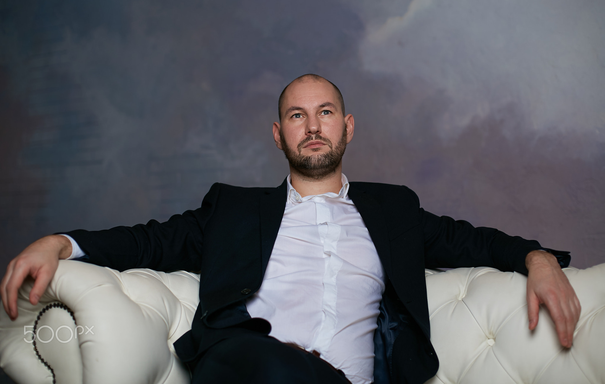 businessman sitting in chair