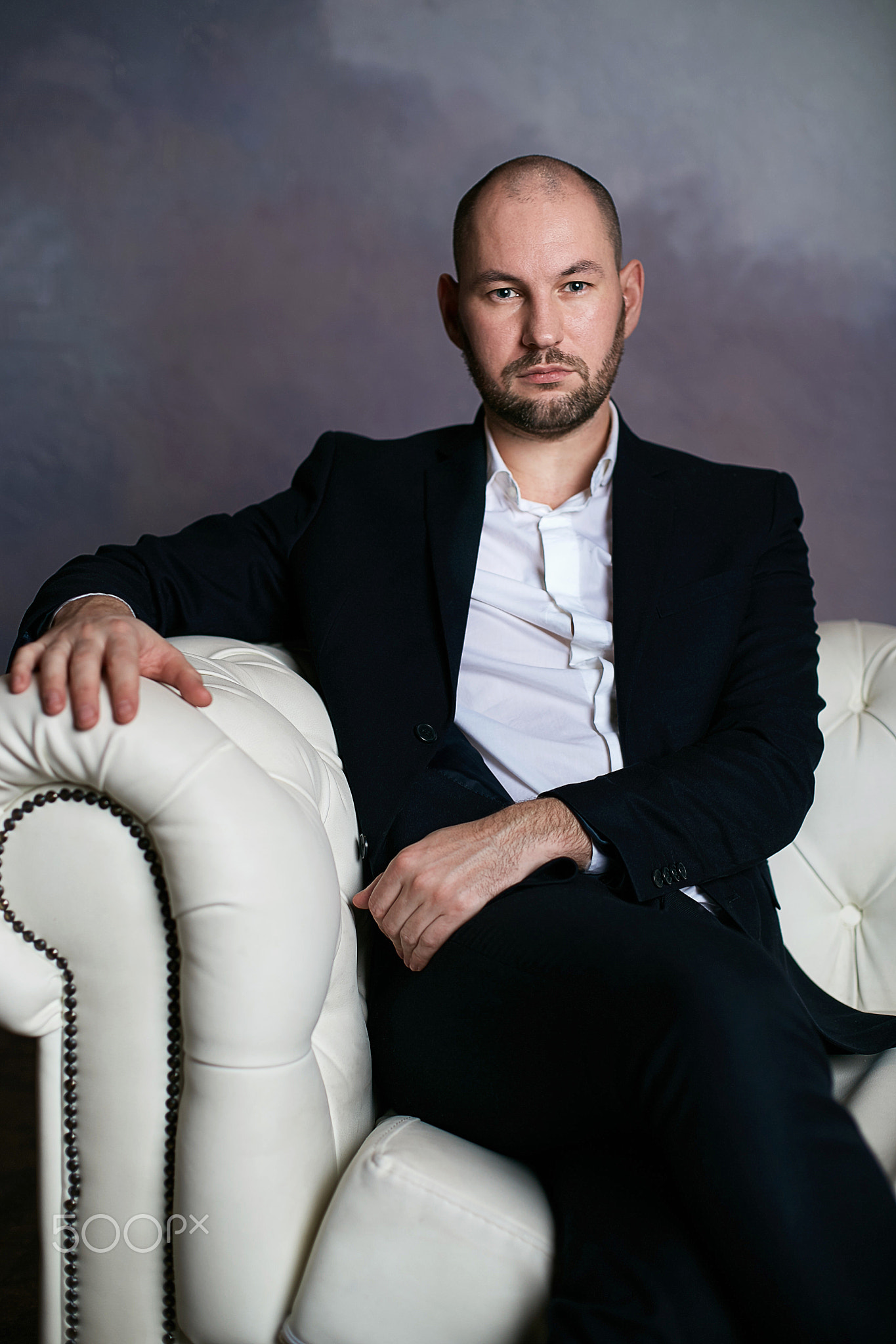 businessman sitting in chair