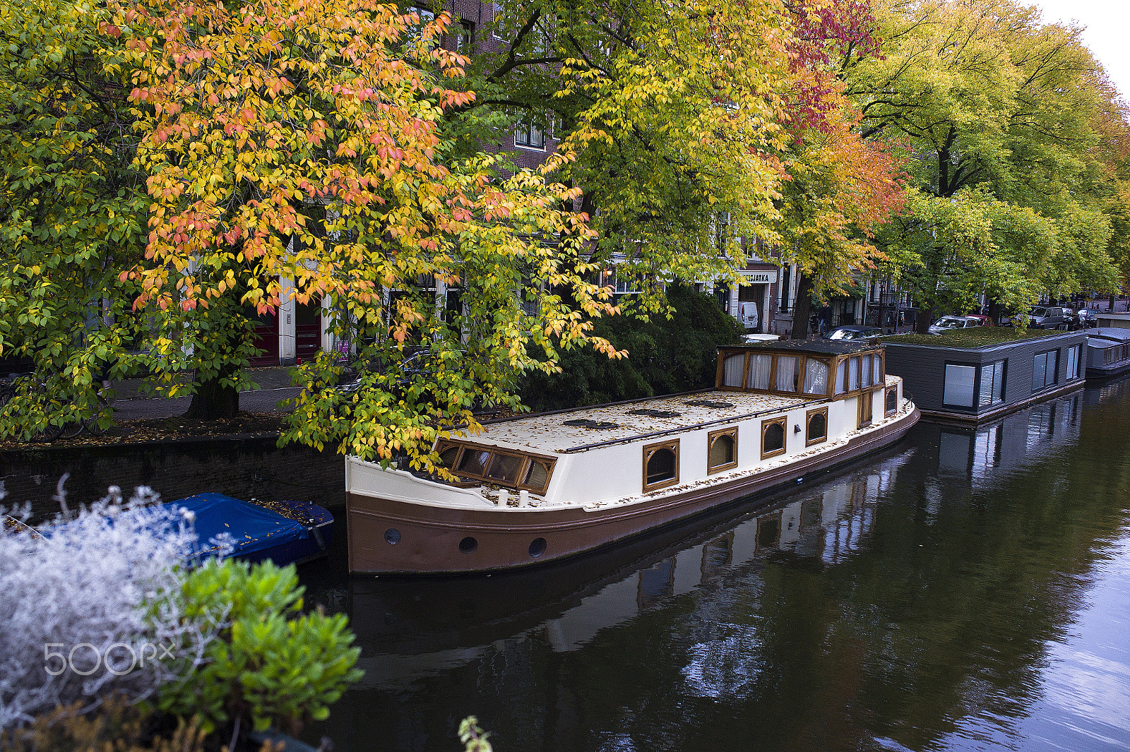 Leica M9 + Leica Summicron-M 28mm F2 ASPH sample photo. Canal view and a boat houses photography