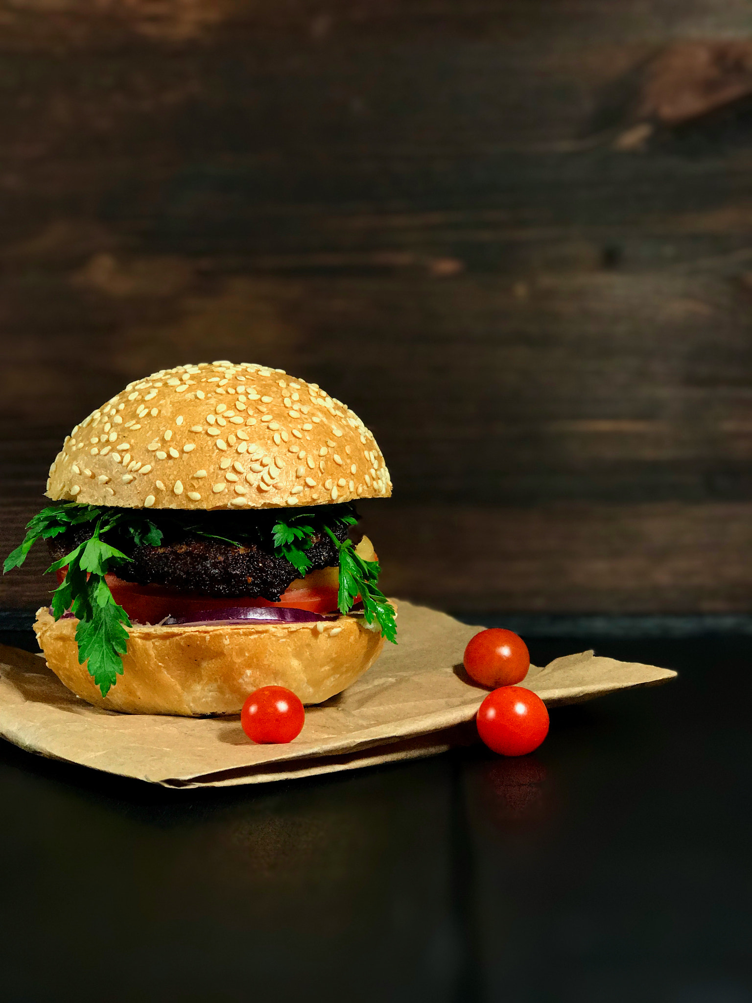 Apple iPhone 7 Plus sample photo. Beef burger sesame bun with tomato and onion on craft paper photography