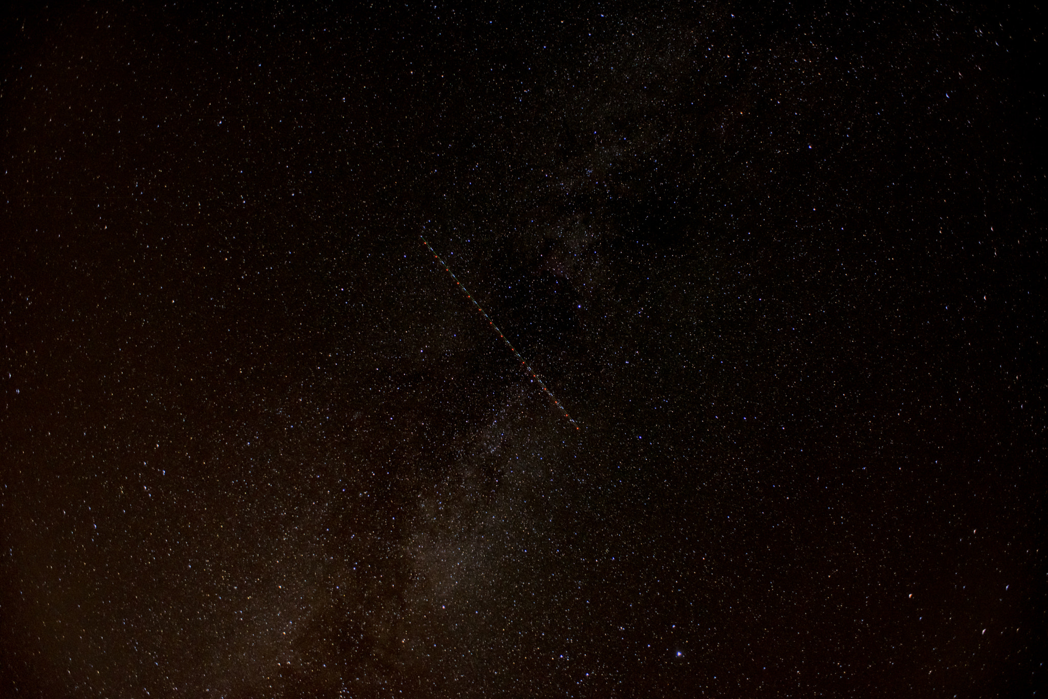 Nikon AF-S Nikkor 28-70mm F2.8 ED-IF sample photo. Plane through the milky way photography