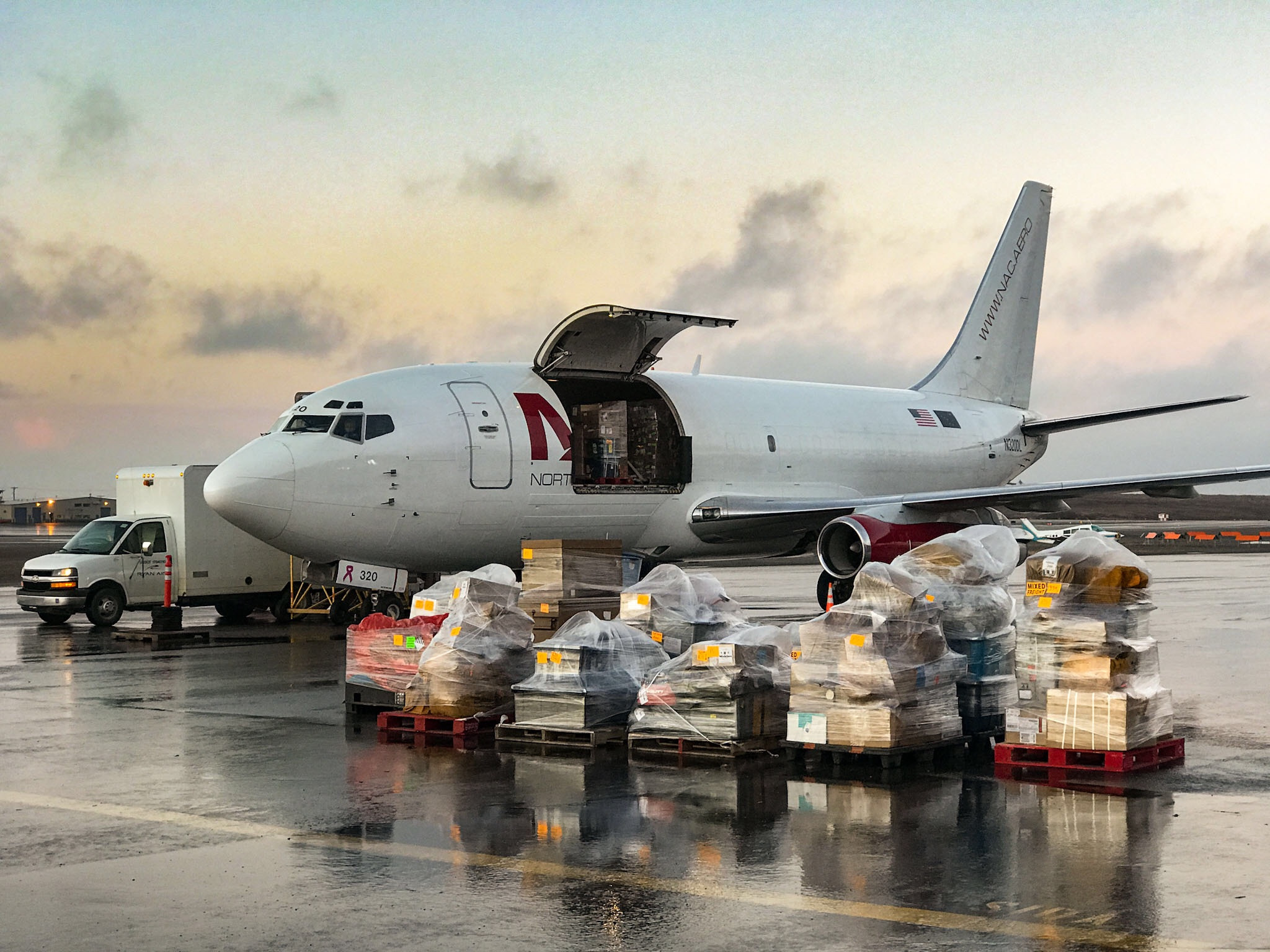 Apple iPhone 7 Plus sample photo. A boeing #737-200 #freighter being unloaded on the ... photography