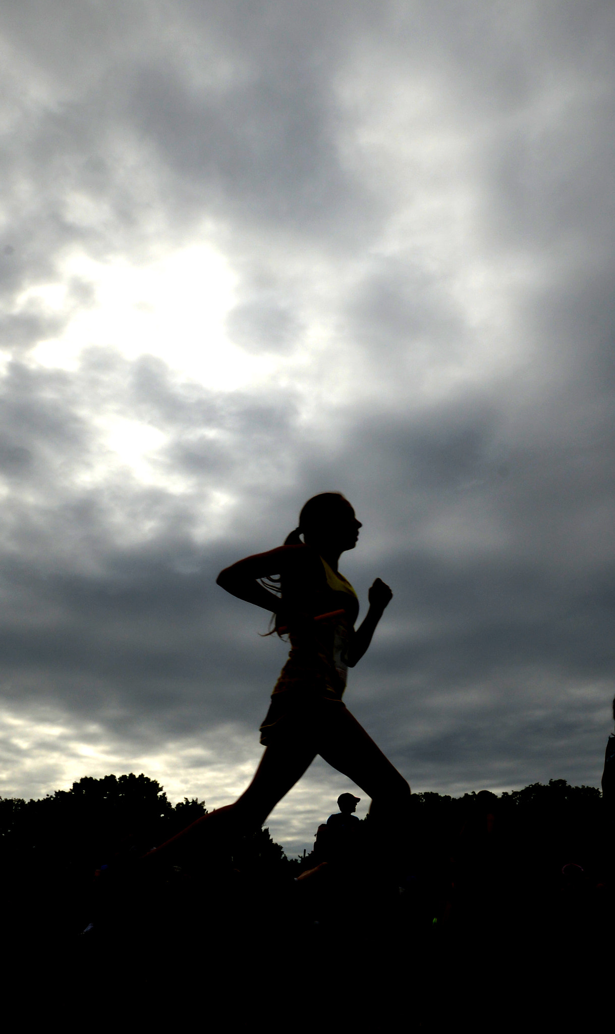 Nikon D600 + Sigma 10-20mm F3.5 EX DC HSM sample photo. Jim vaiknoras/staff photo a runner makes her way to the finish line at the clipper relay saturday... photography