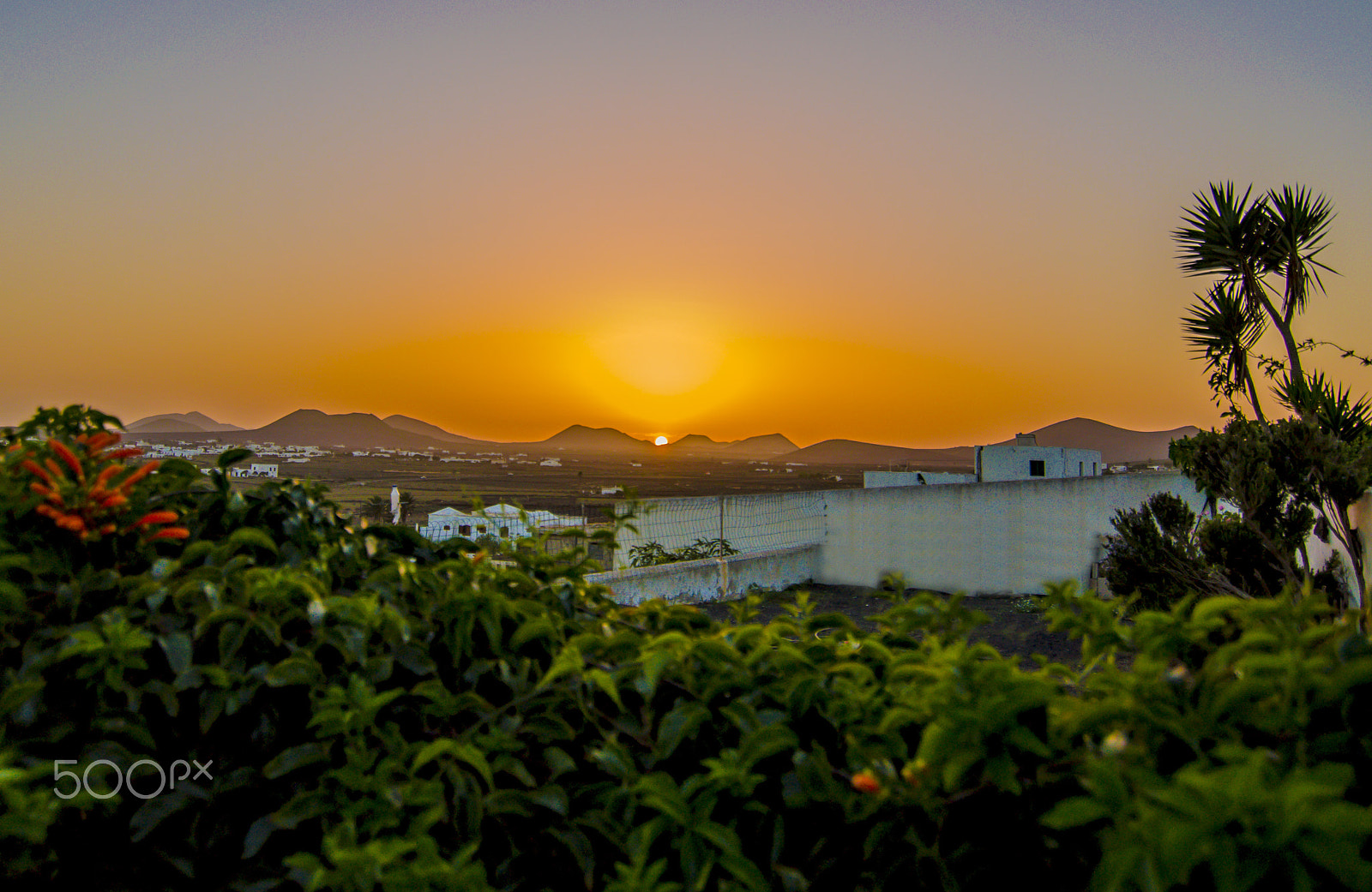 Nikon D90 + Tokina AT-X Pro 11-16mm F2.8 DX II sample photo. Sunset over volcanoes photography