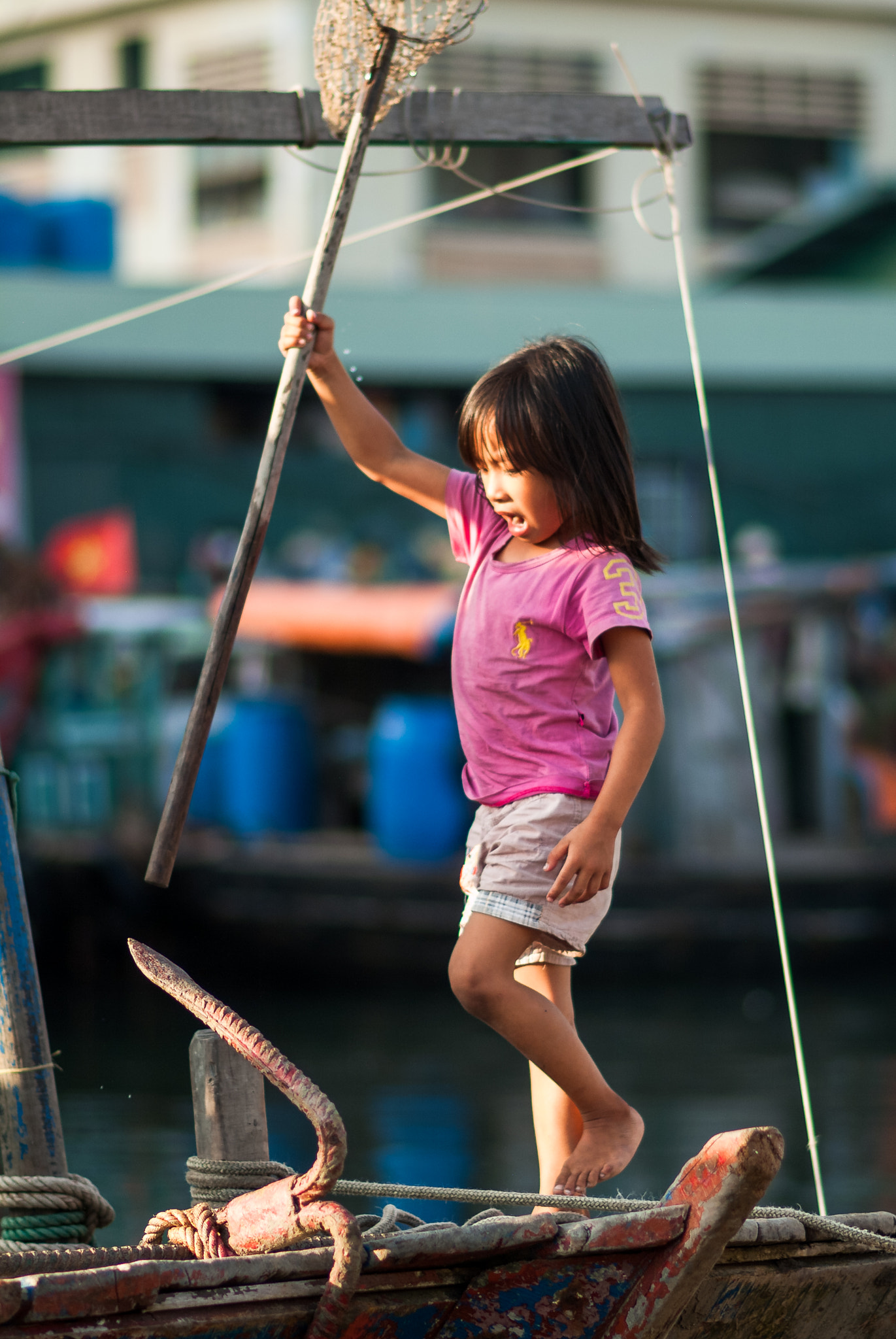 Fujifilm FinePix S2 Pro sample photo. Small girl living on the boat with her family. photography