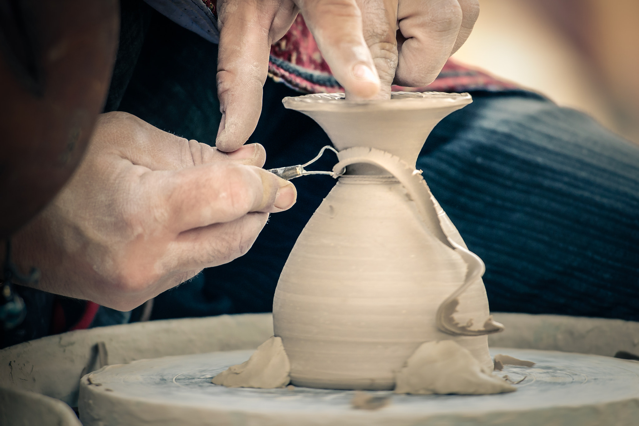 Nikon AF-S Nikkor 70-200mm F2.8G ED VR II sample photo. Hands and clay photography
