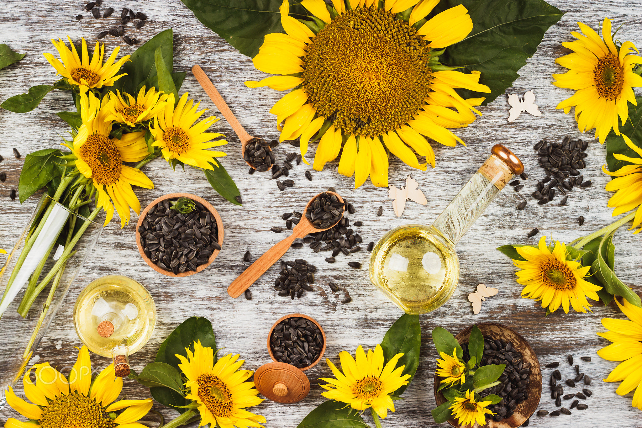Sunflowers, bottle with oil and sunflowers seed