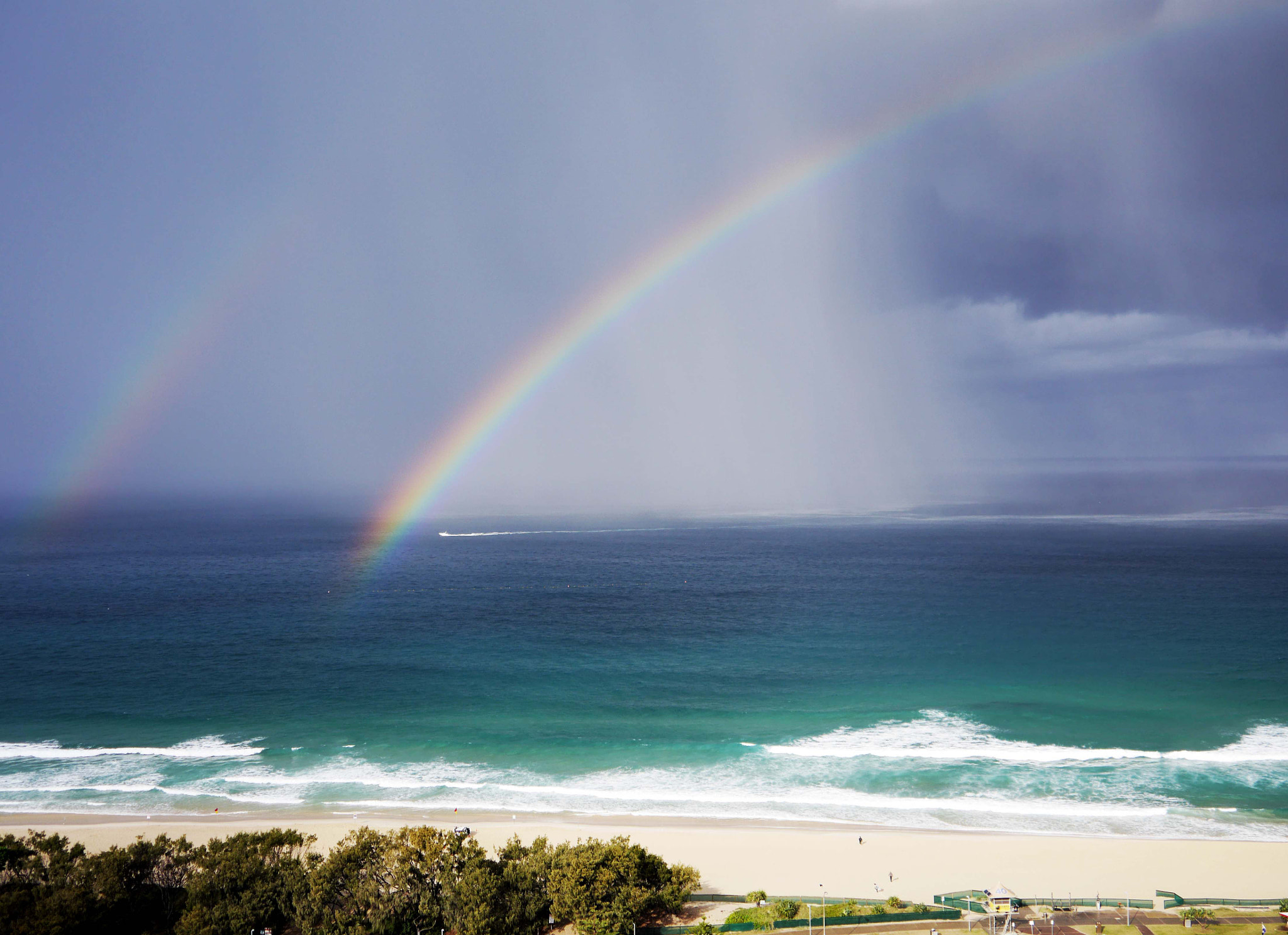Panasonic Lumix DMC-GH3 sample photo. Rainbow  rain and boat photography