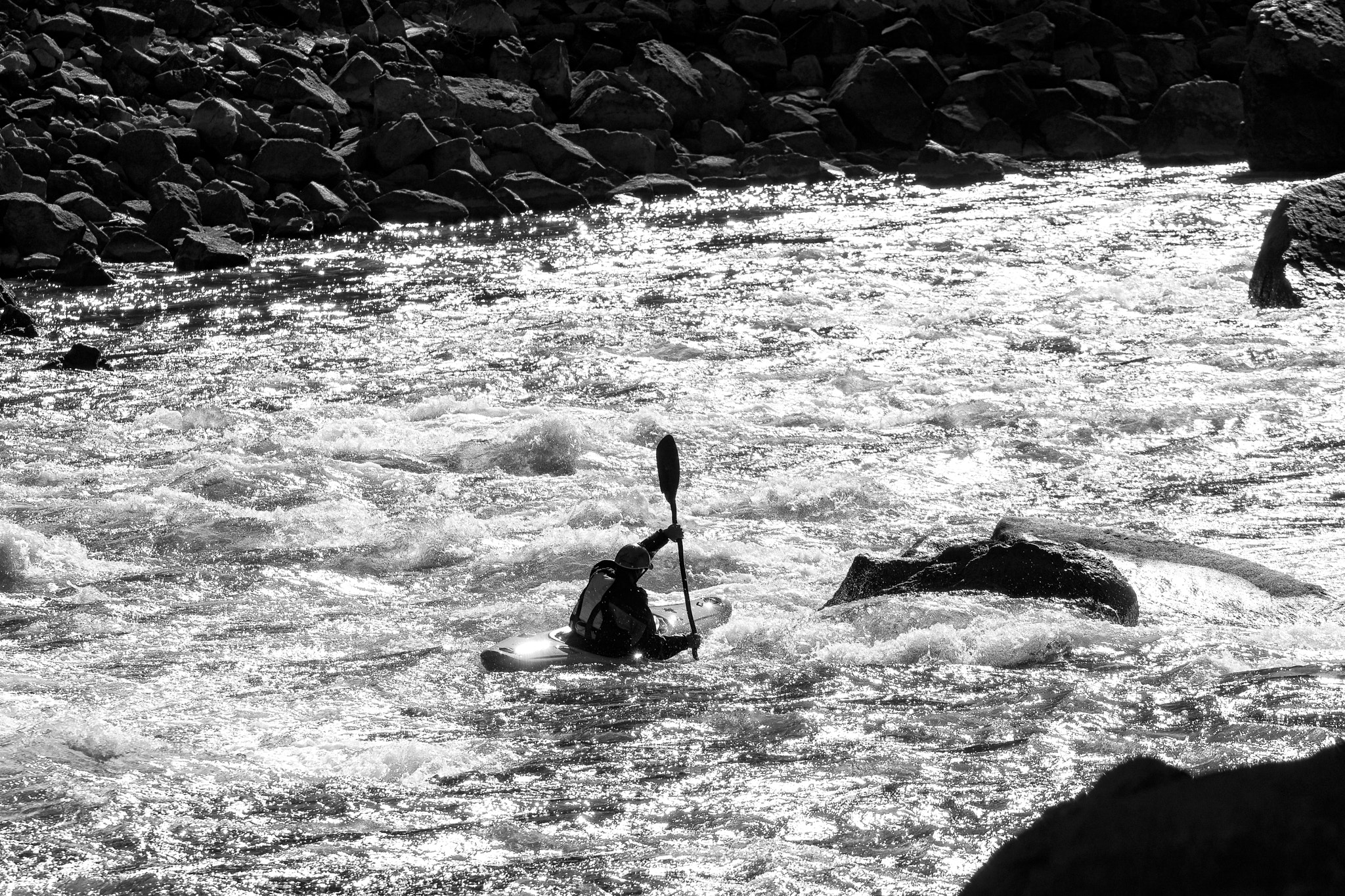 Sony a6300 sample photo. Kayaker going down rapids in kayak photography