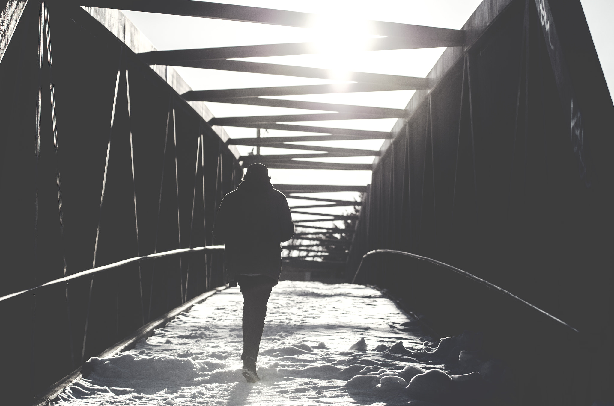 Pentax K-500 sample photo. Person walking on bridge photography