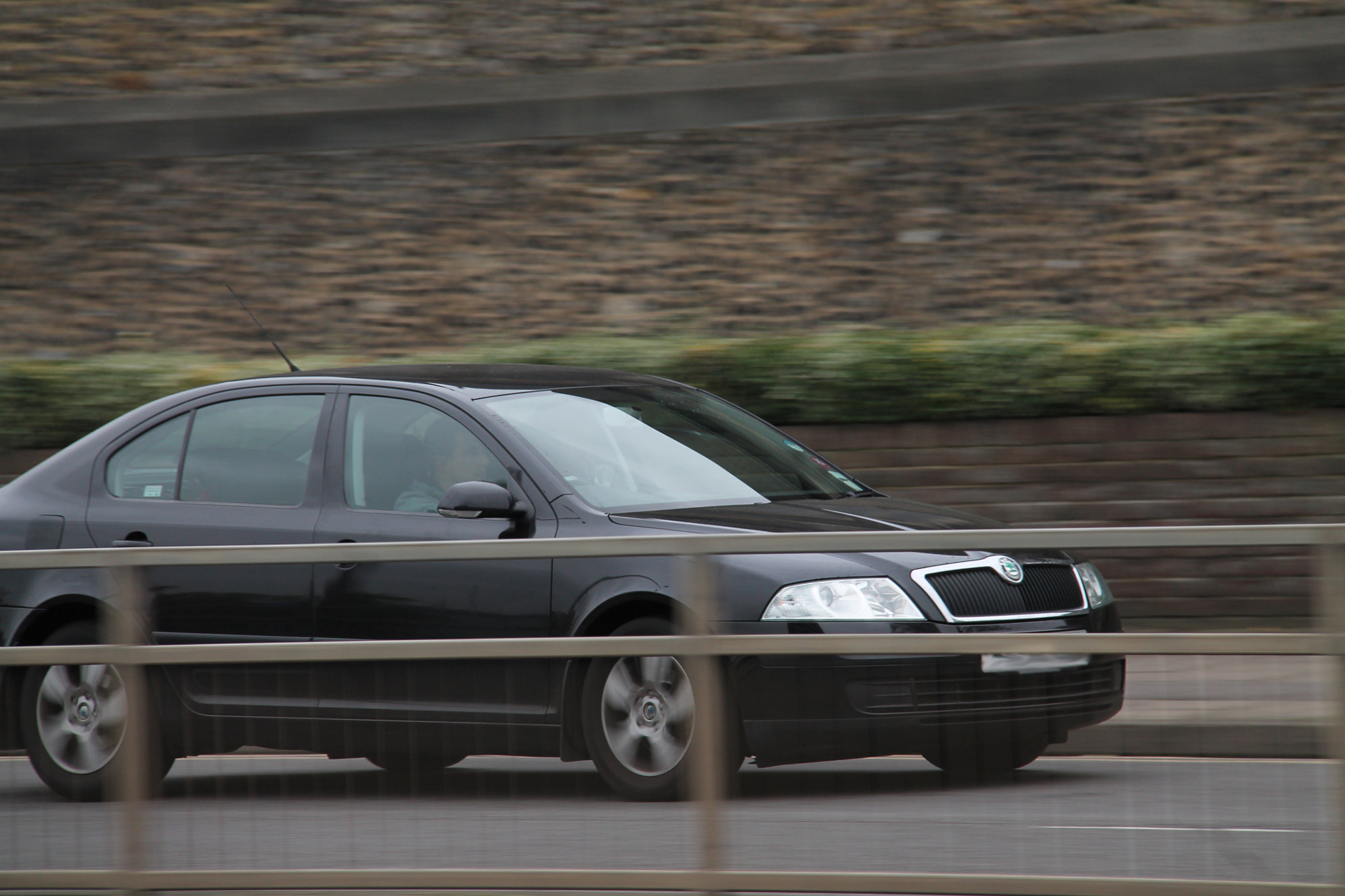 Canon EF-S 18-200mm F3.5-5.6 IS sample photo. Focused drive-by photography