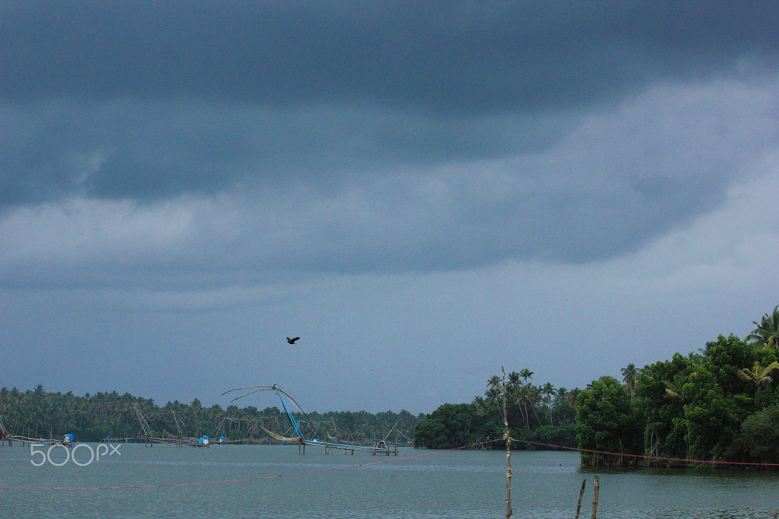 Canon EF 70-300mm F4-5.6L IS USM sample photo. Three layers of dark clouds photography