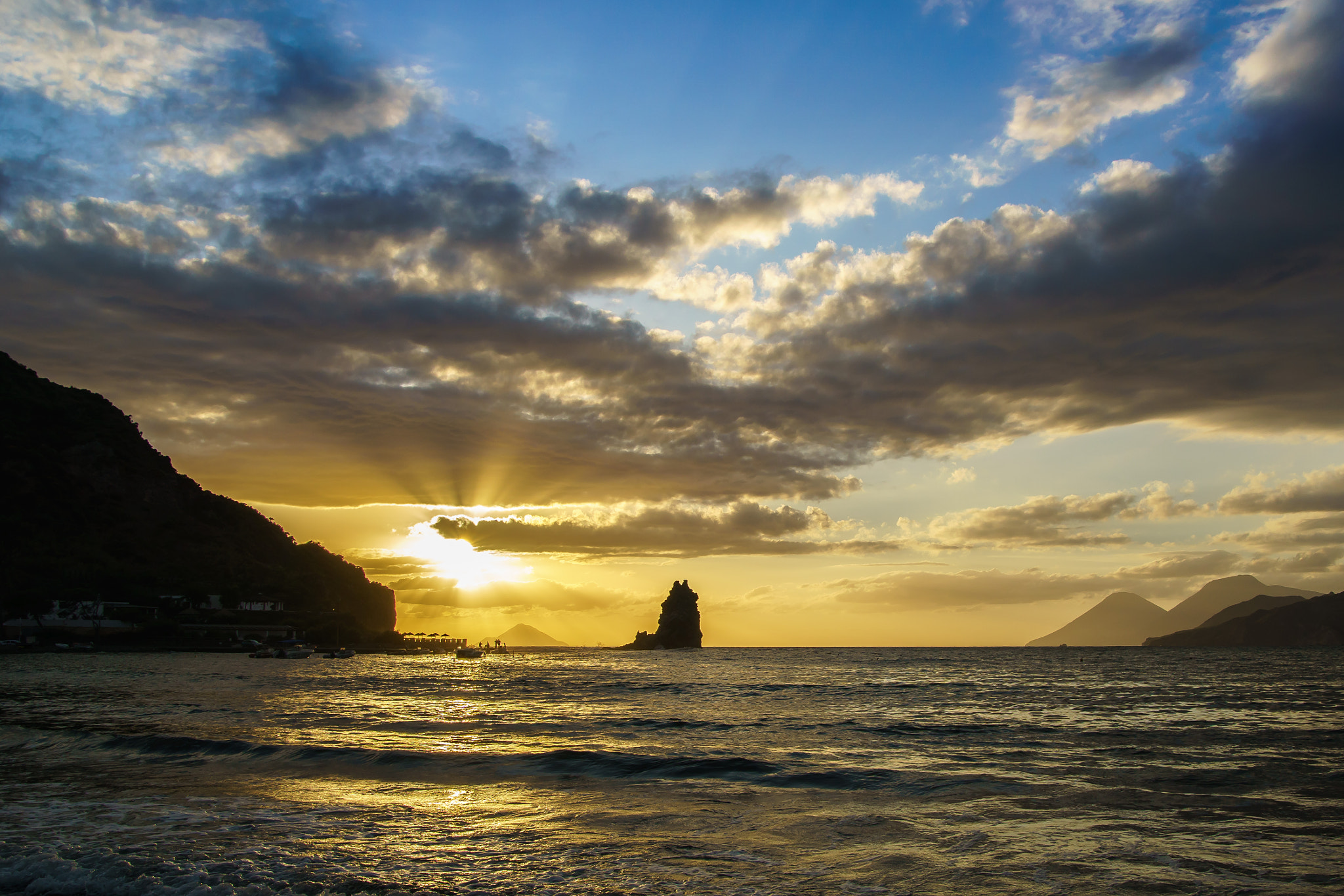 Sony ILCA-77M2 sample photo. The beach of vulcano during sunset photography