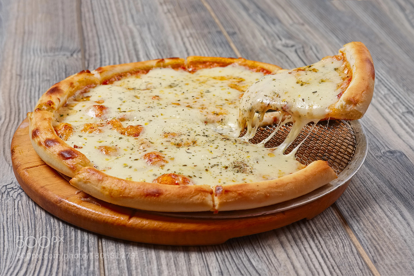Fujifilm X-T1 sample photo. Slice of pizza with photography