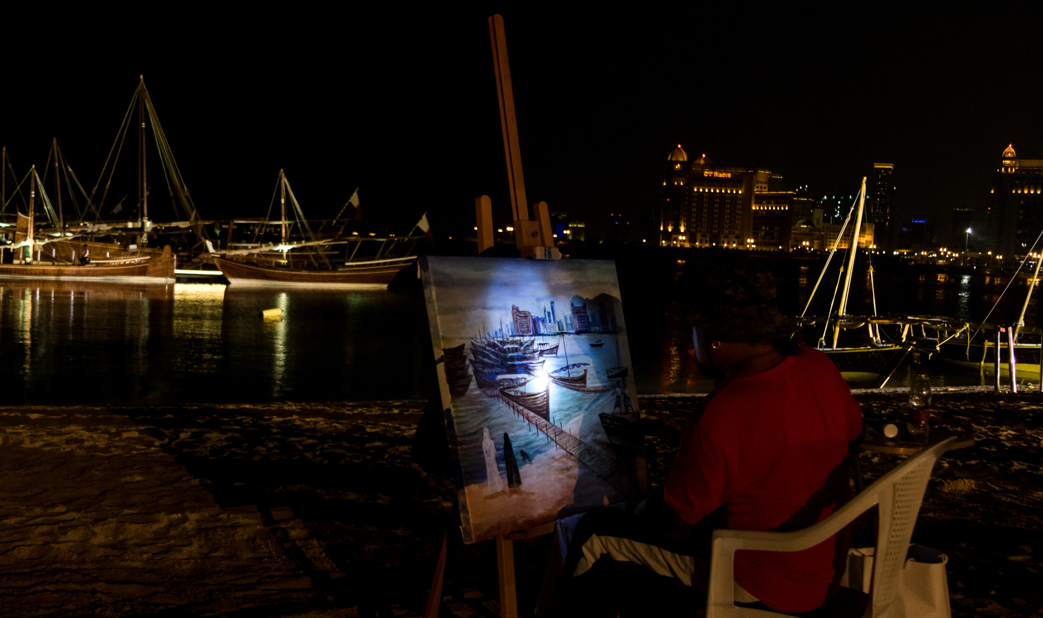 Canon EF 28-135mm F3.5-5.6 IS USM sample photo. A painter draw the boat picture photography