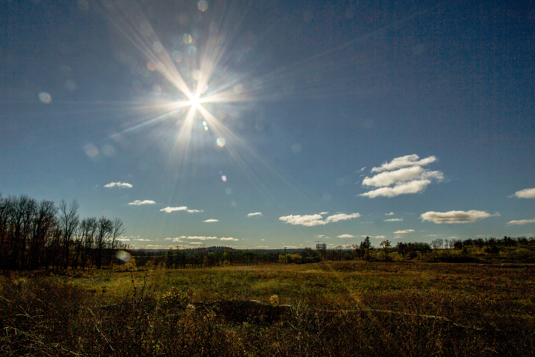 Canon EF-S 10-22mm F3.5-4.5 USM sample photo. Sun flare over the concord photography