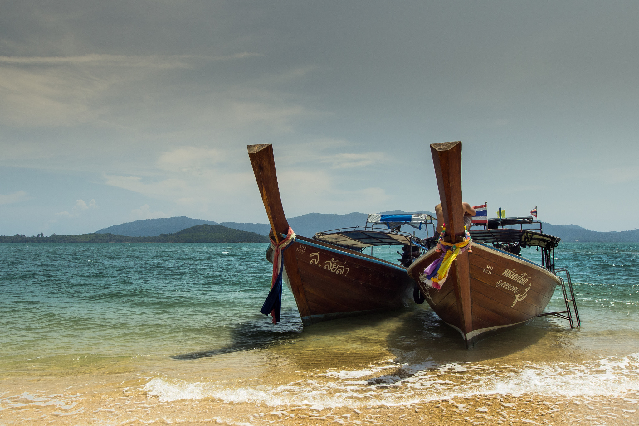 Olympus Zuiko Digital ED 9-18mm F4.0-5.6 sample photo. Lonely boats photography