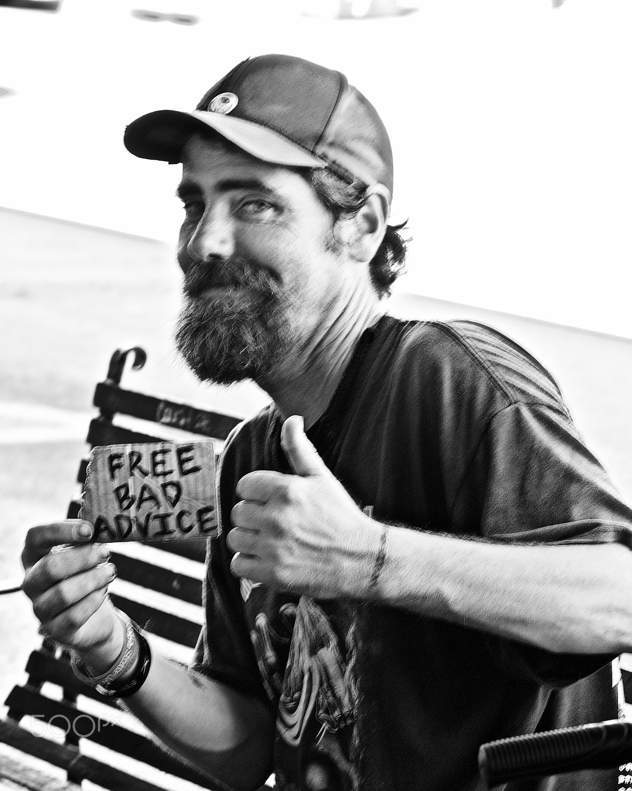 Sony a7R II + Sony FE 90mm F2.8 Macro G OSS sample photo. Humorous homeless man photography