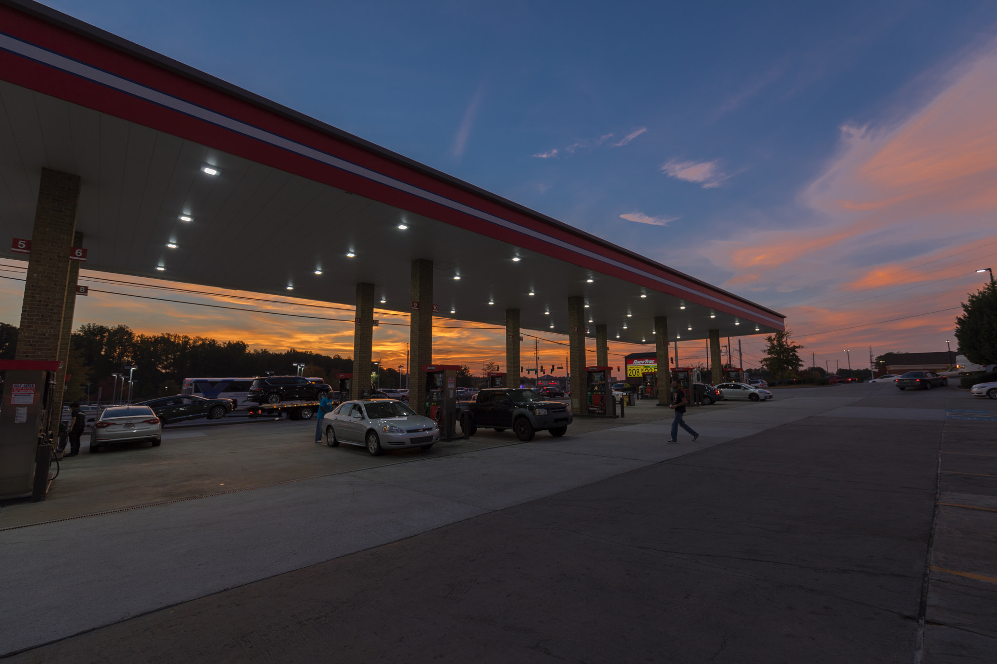 Canon EF 300mm f/2.8L sample photo. Gas station sky photography