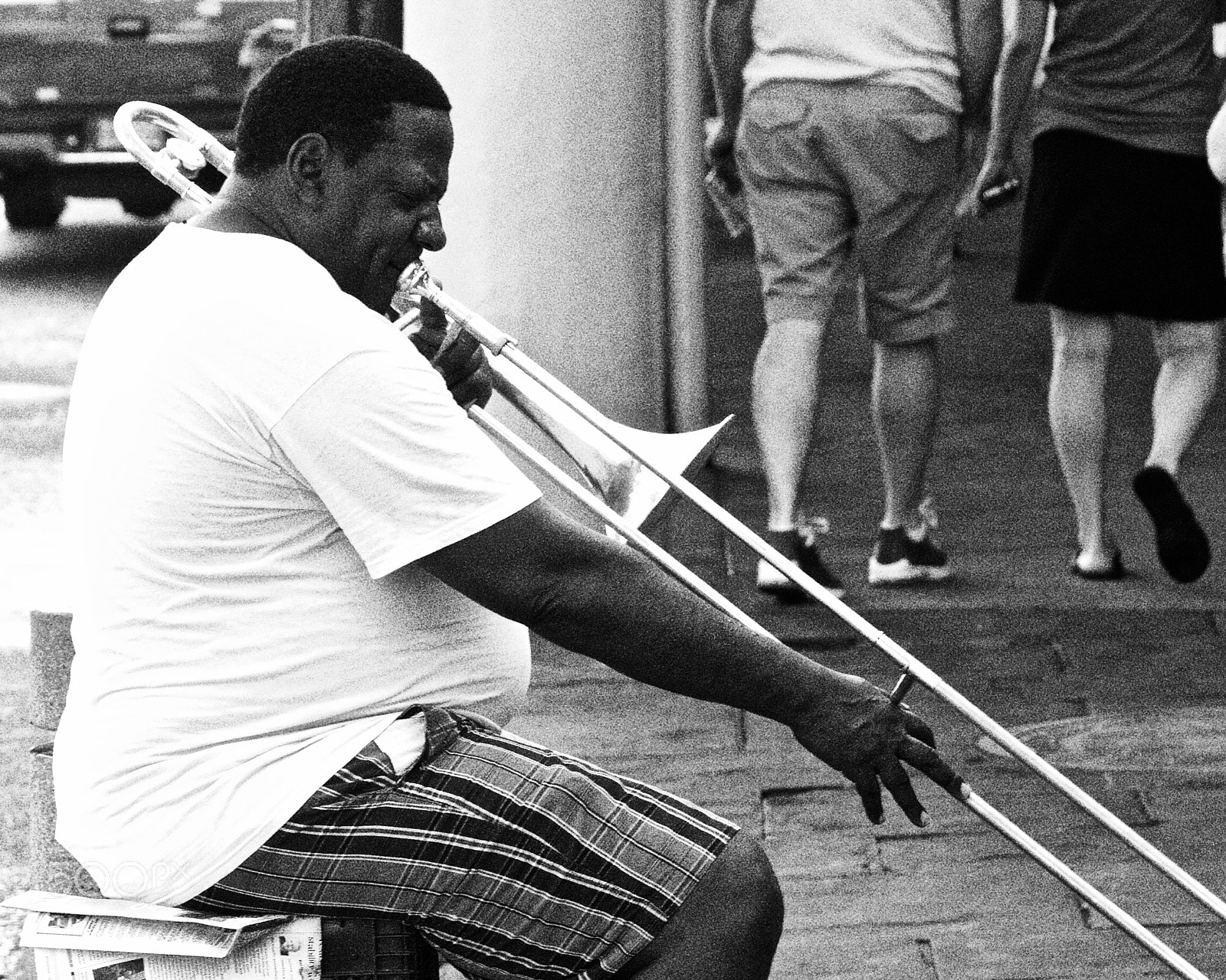 Sony a7R II + Sony FE 90mm F2.8 Macro G OSS sample photo. Street musician with trombone photography