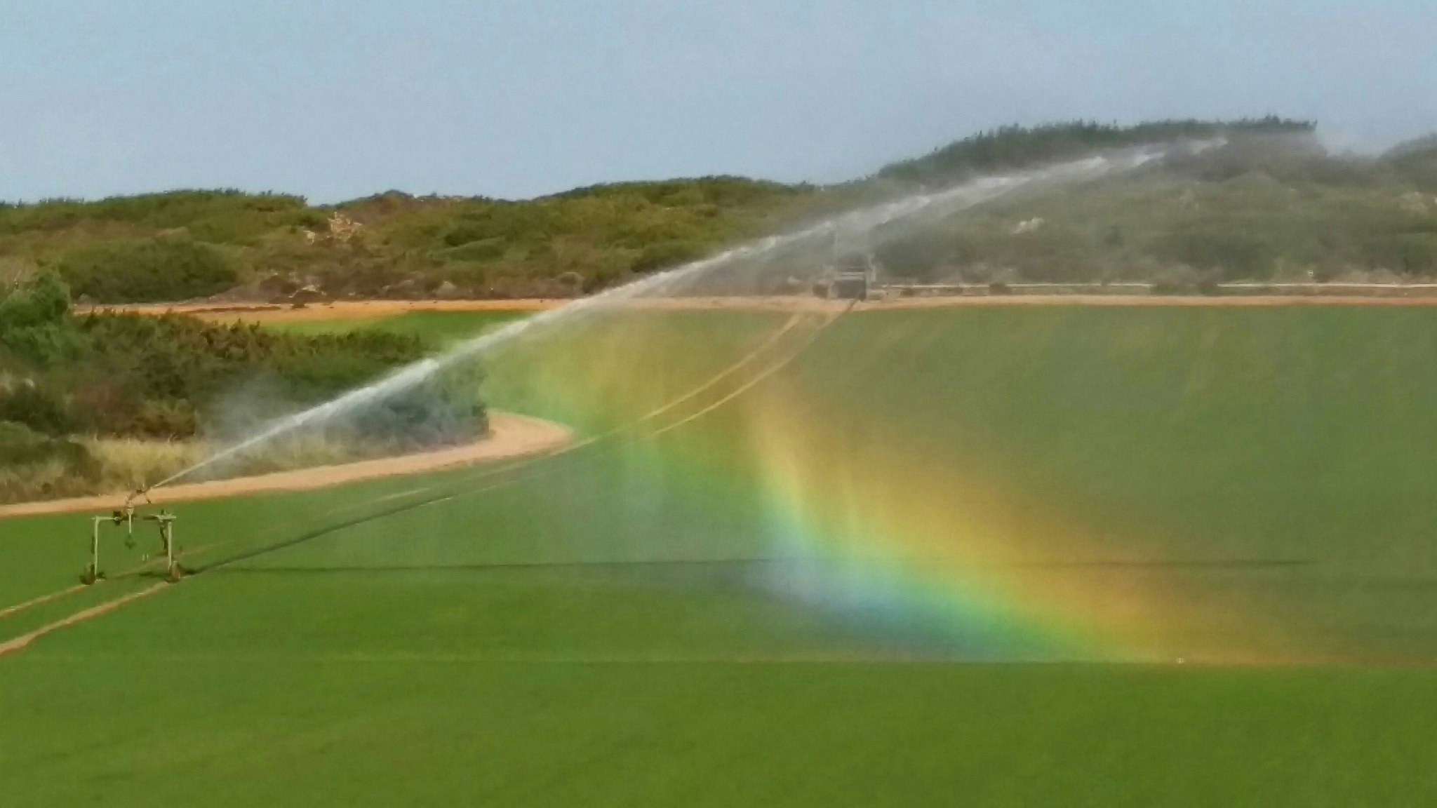 HTC M9 sample photo. Aspersor con arco iris en campo de vila nova de milfontes (portugal). photography